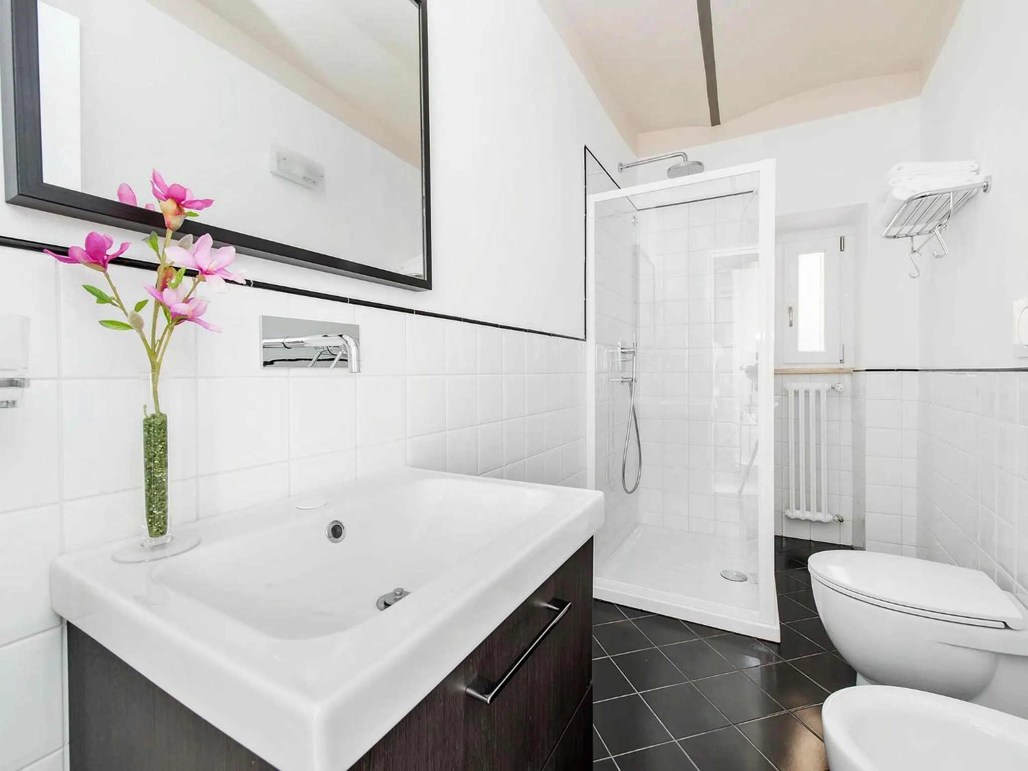 Bathroom in White Rooms Colosseo