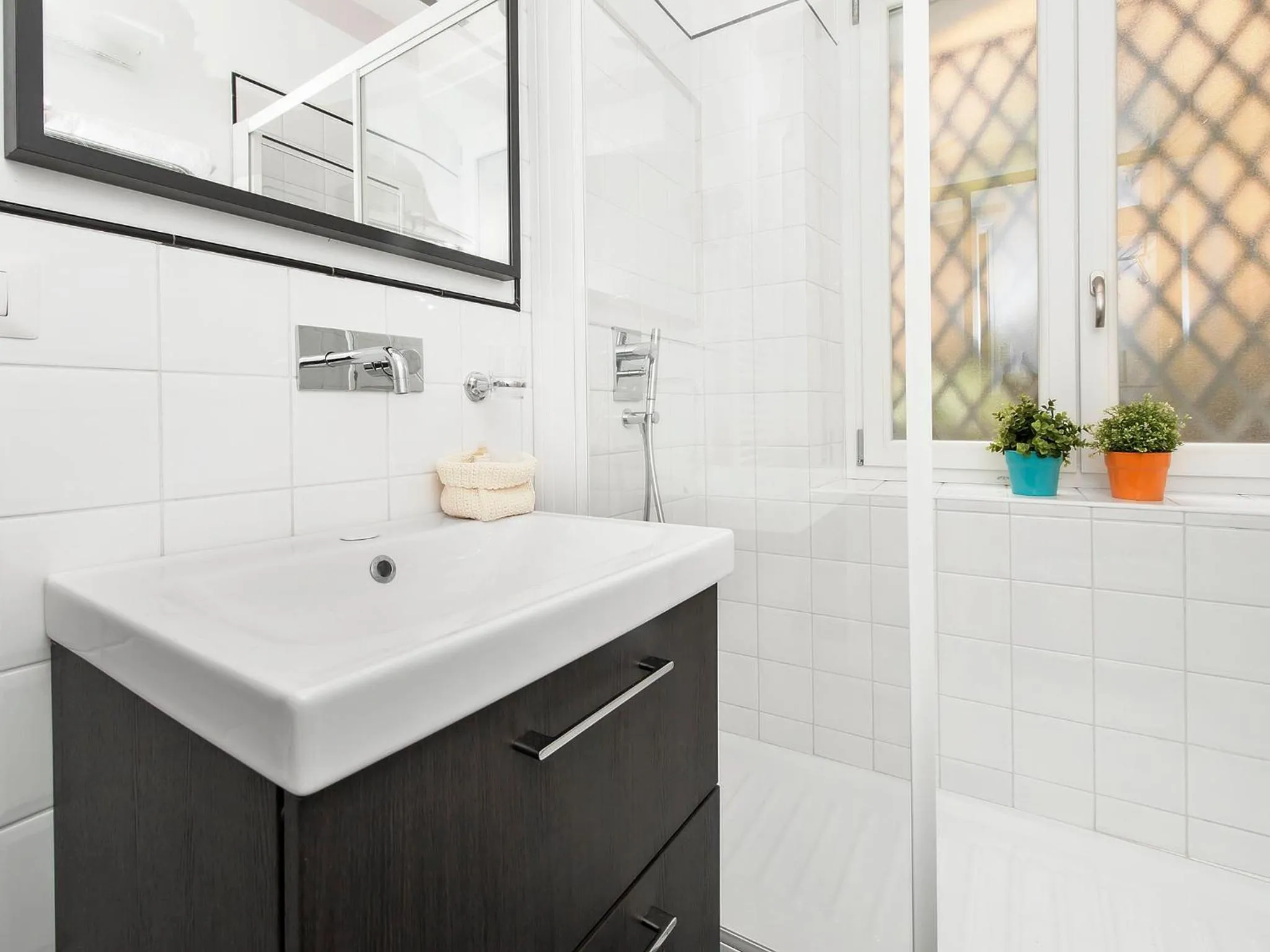 Bathroom in White Rooms Colosseo