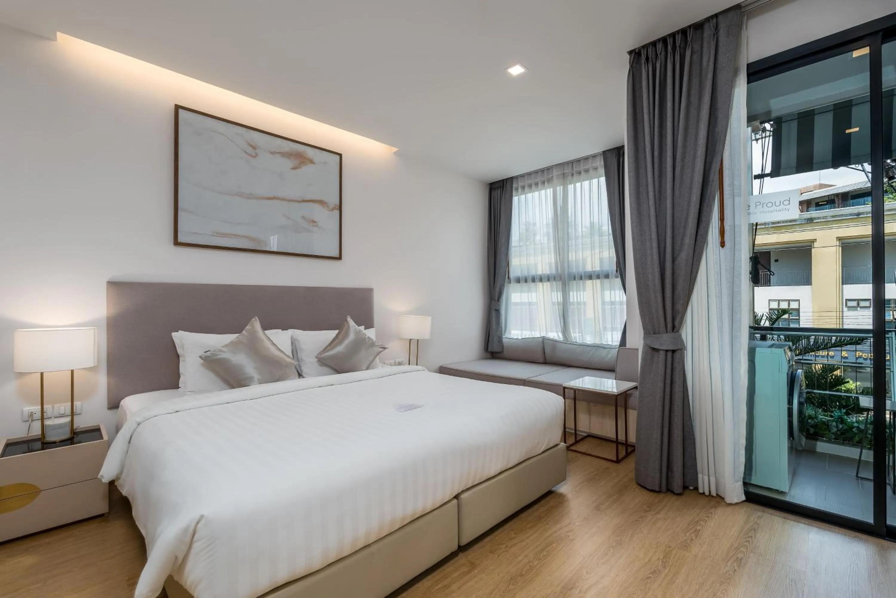 Photo of the whole room, Bed in The Proud Rawai Resort