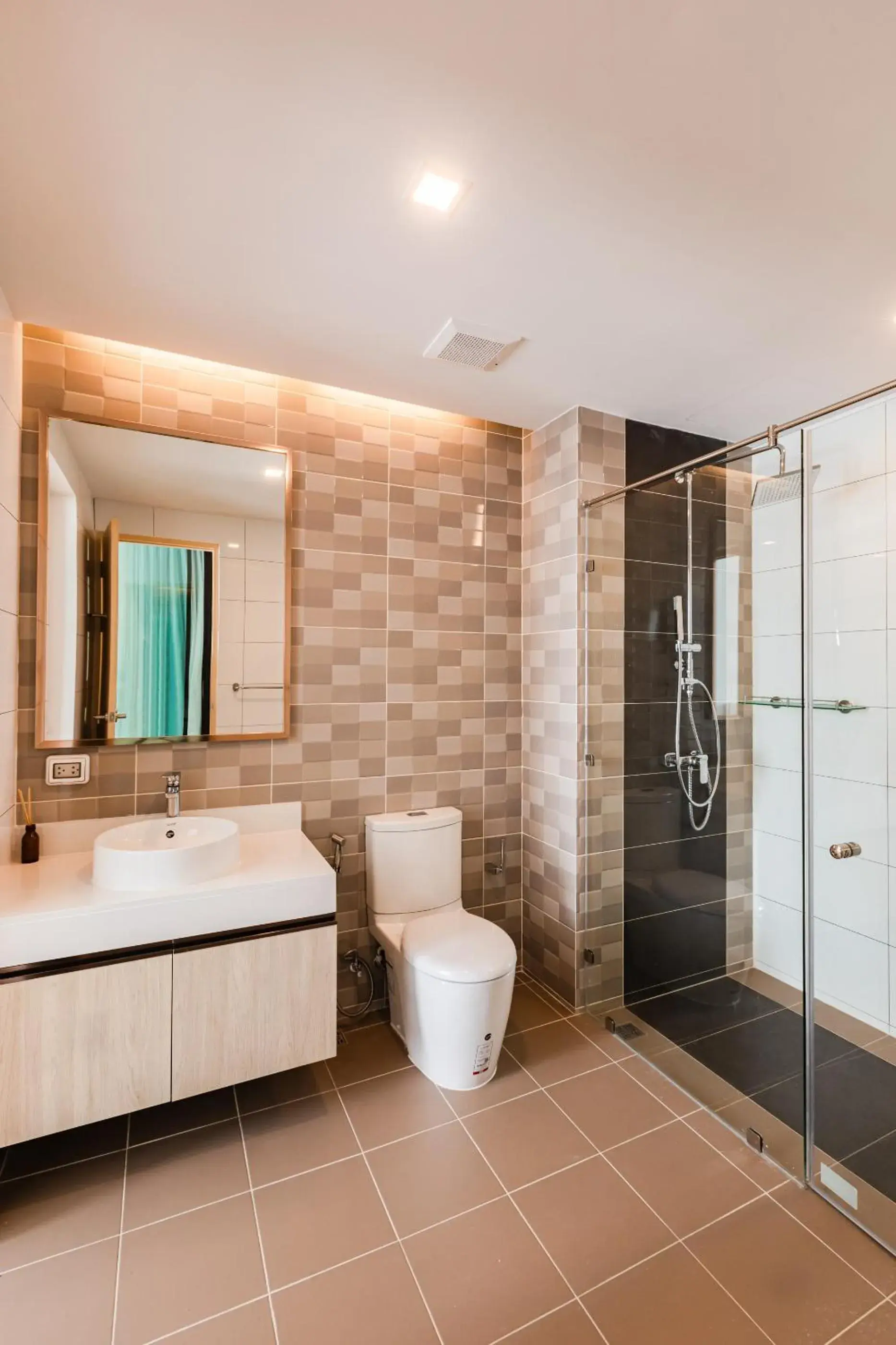 Bathroom in The Proud Rawai Resort Bathroom in The Proud Rawai Resort