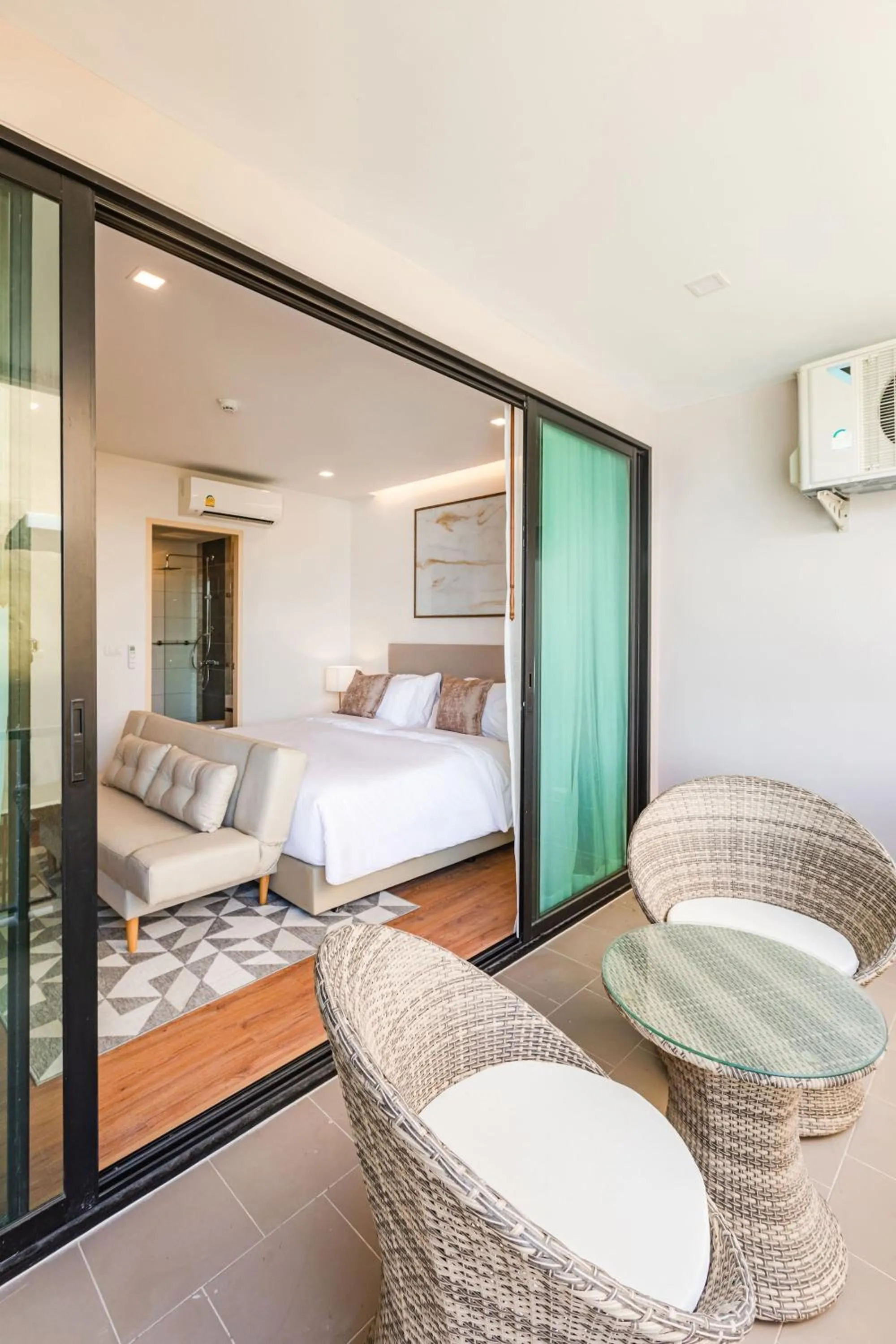 Photo of the whole room, Bed in The Proud Rawai Resort