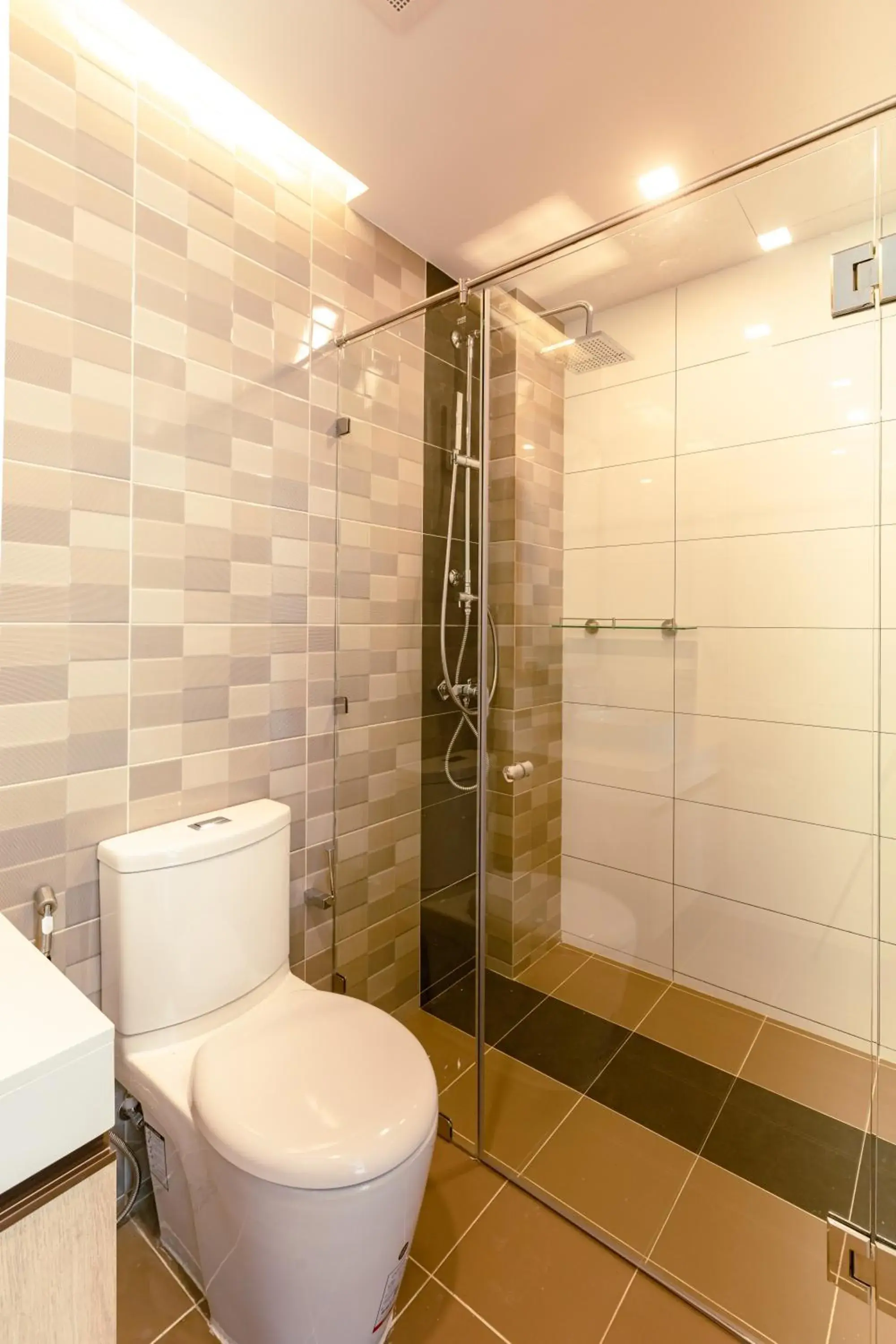 Bathroom in The Proud Rawai Resort Bathroom in The Proud Rawai Resort