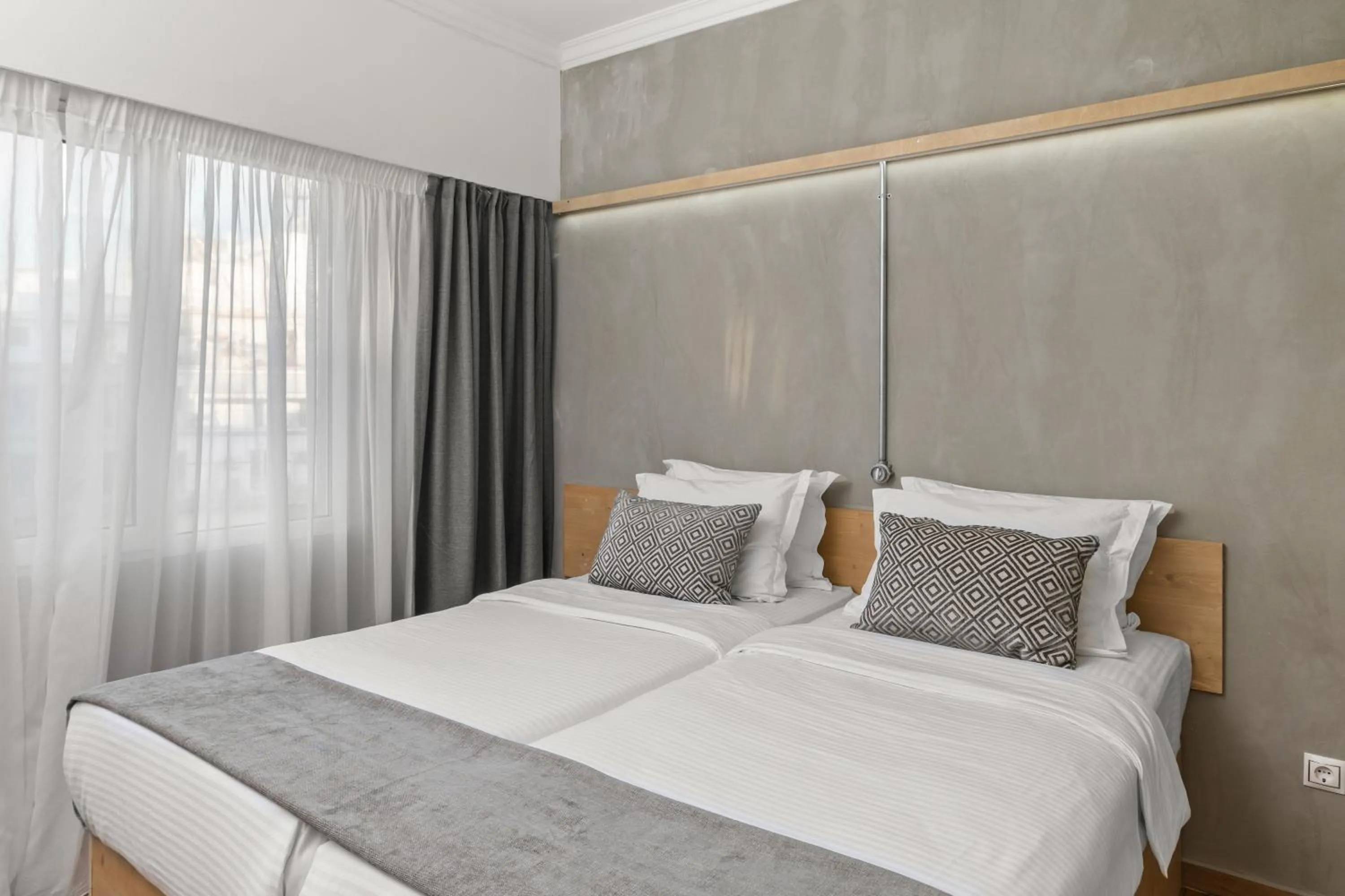 Bed in Athens Warehouse Boutique Hotel & Suites