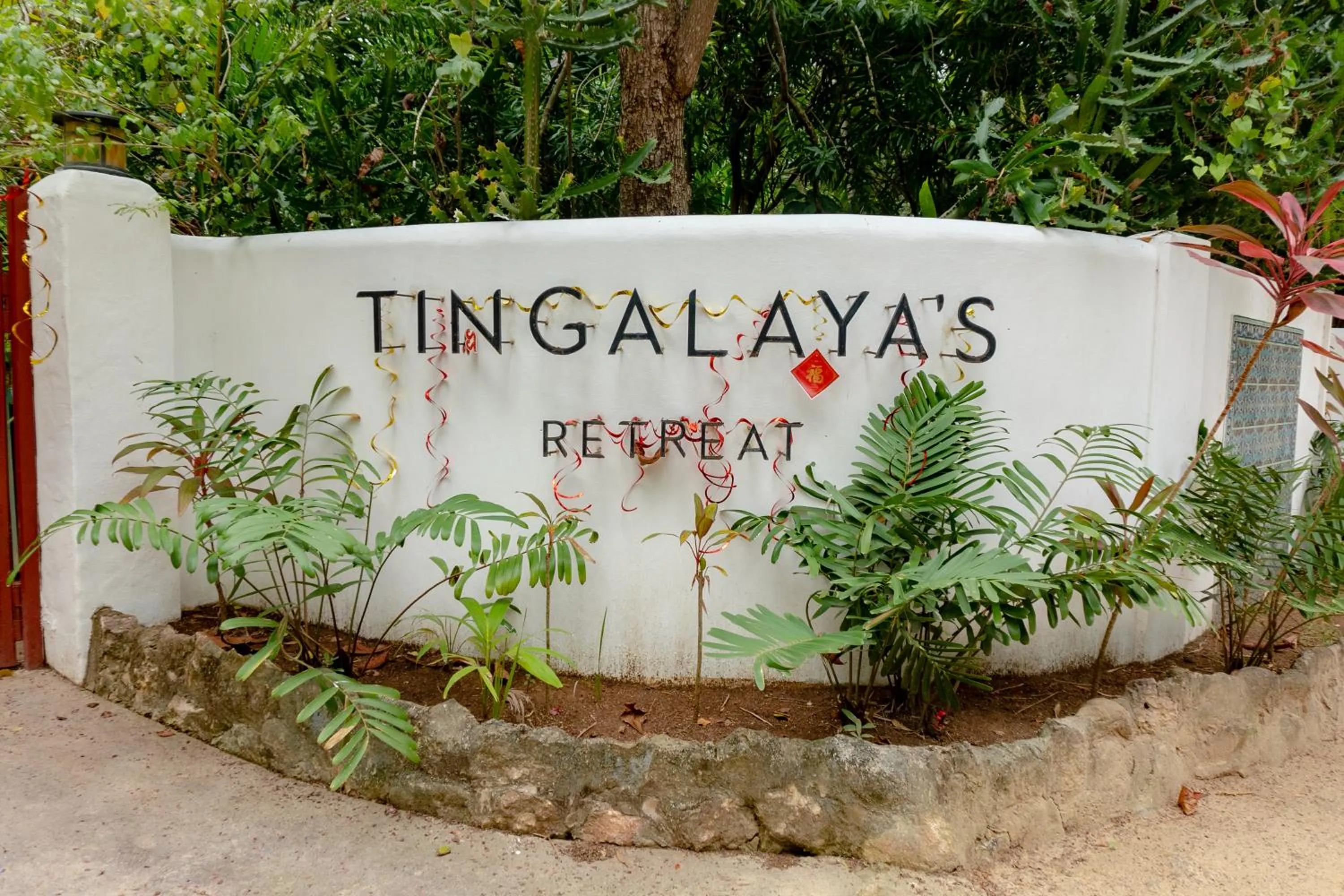 Property logo or sign in Tingalaya's Retreat