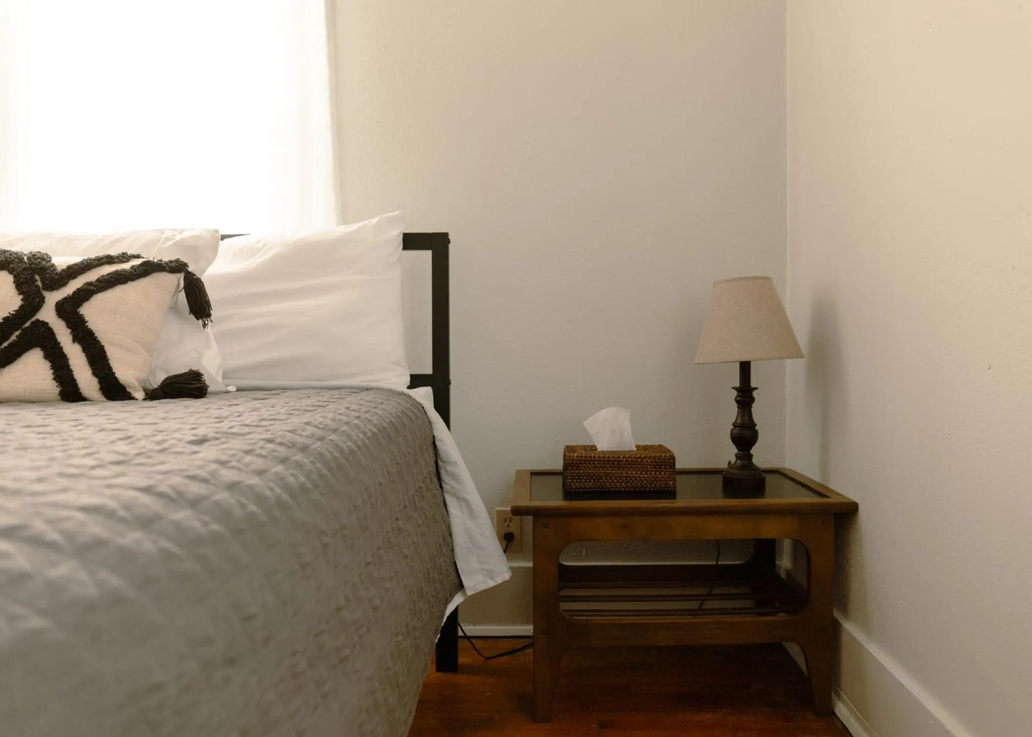 Bed in East Side Motel & Cabins