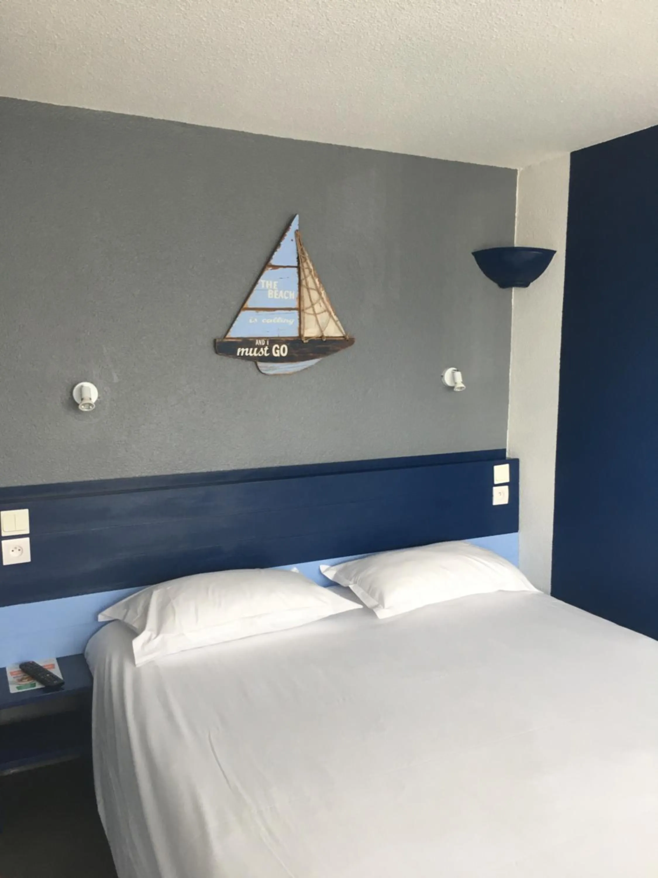 Decorative detail, Bed in Initial by balladins Dieppe