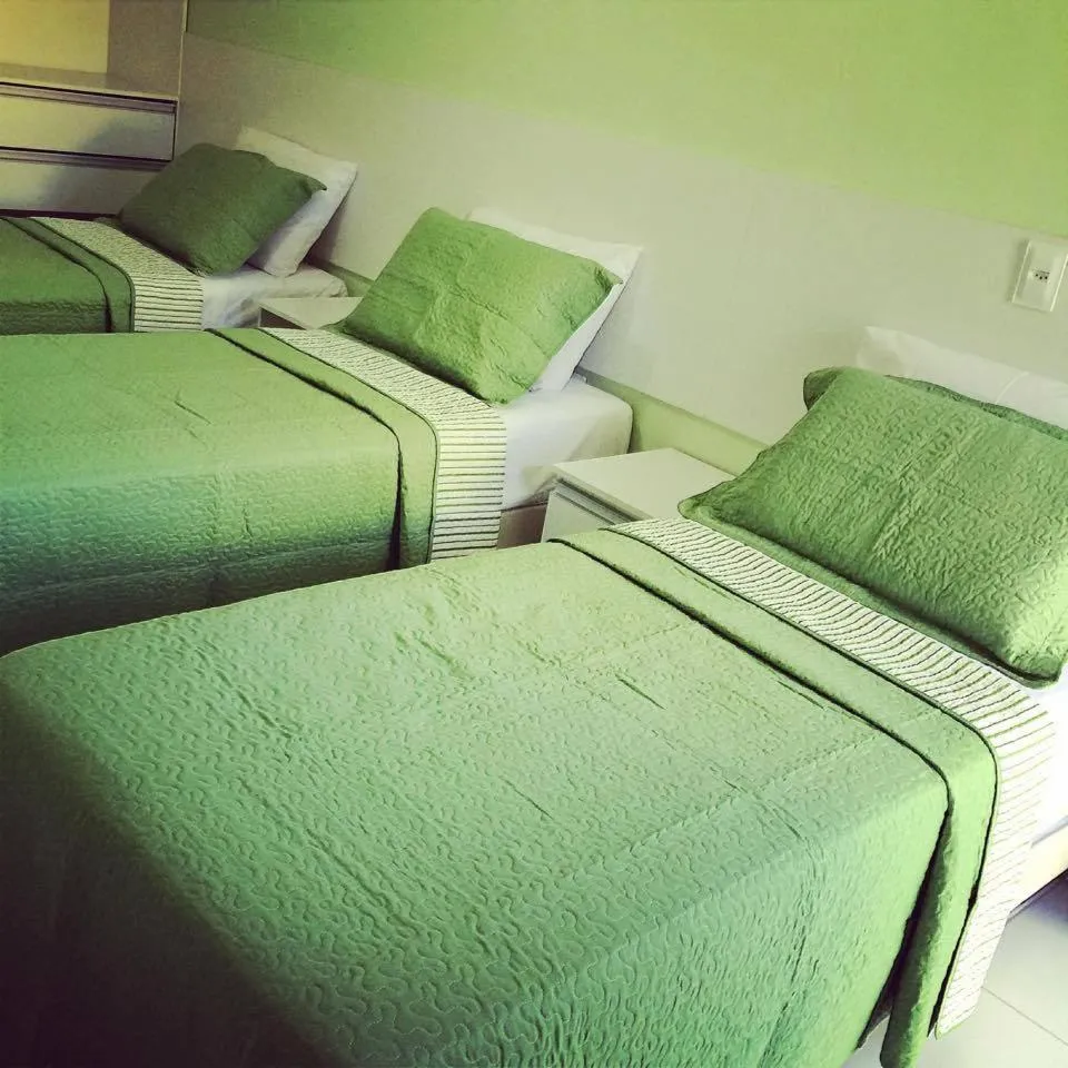 Bed in Pousada Ouriço