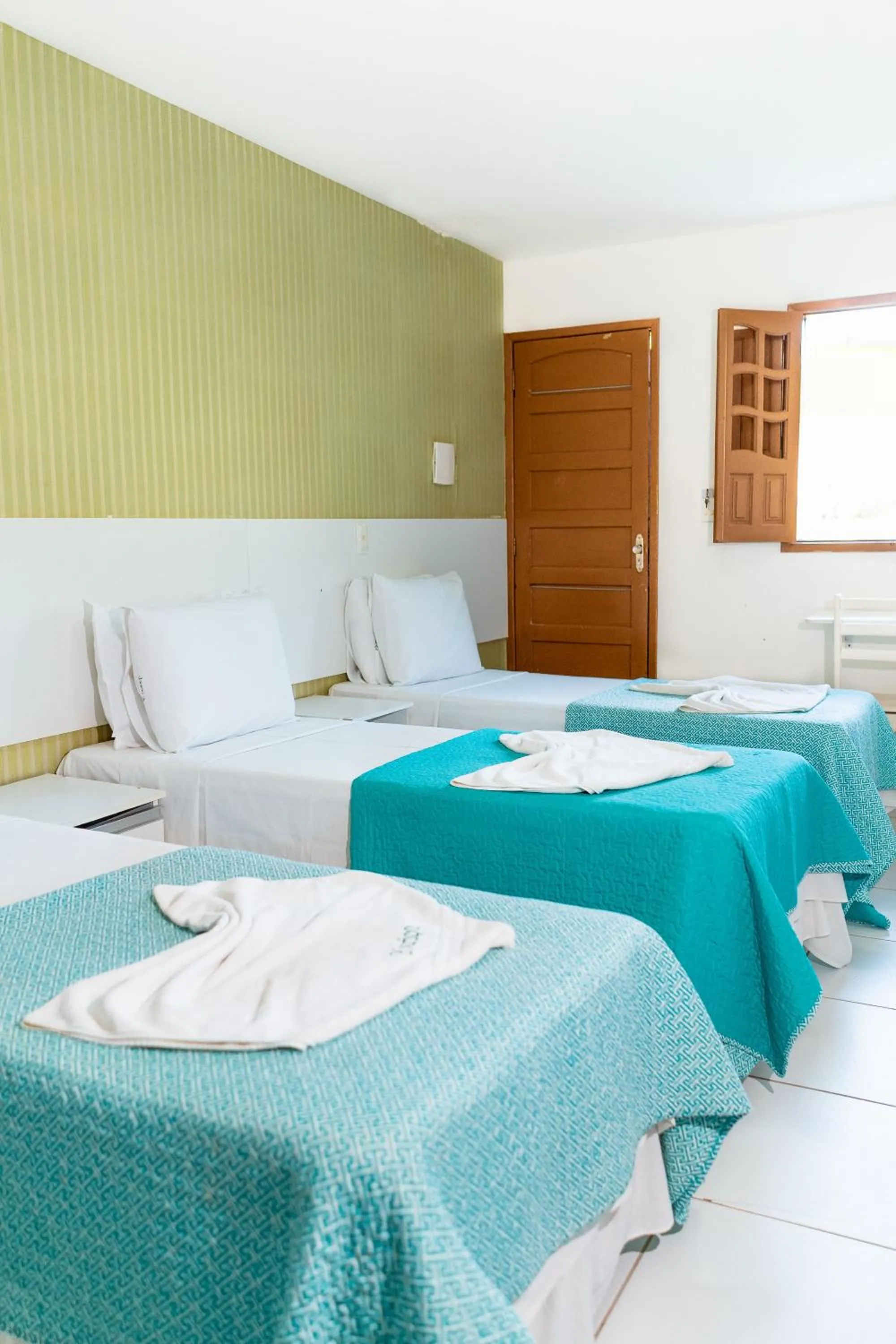 Bed in Pousada Ouriço