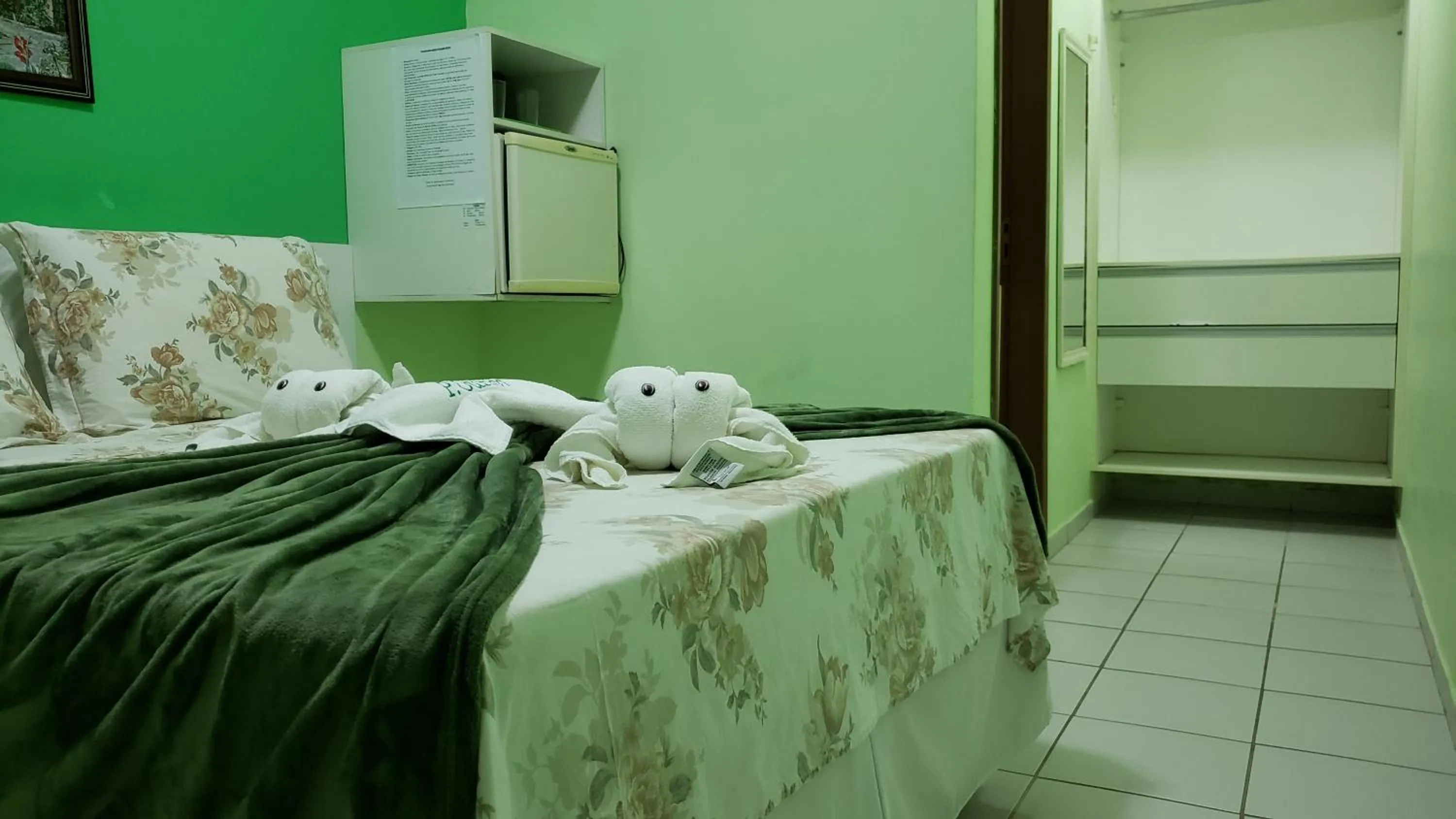 Bed in Pousada Ouriço