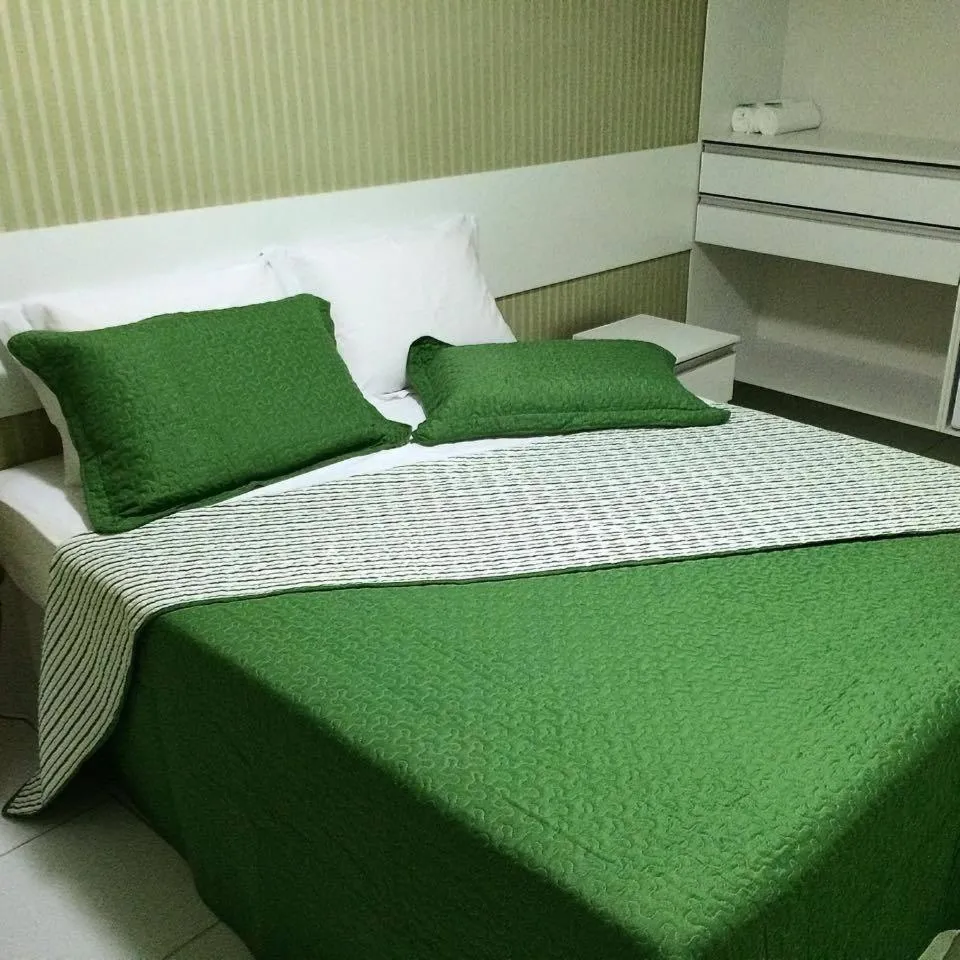 Bed in Pousada Ouriço