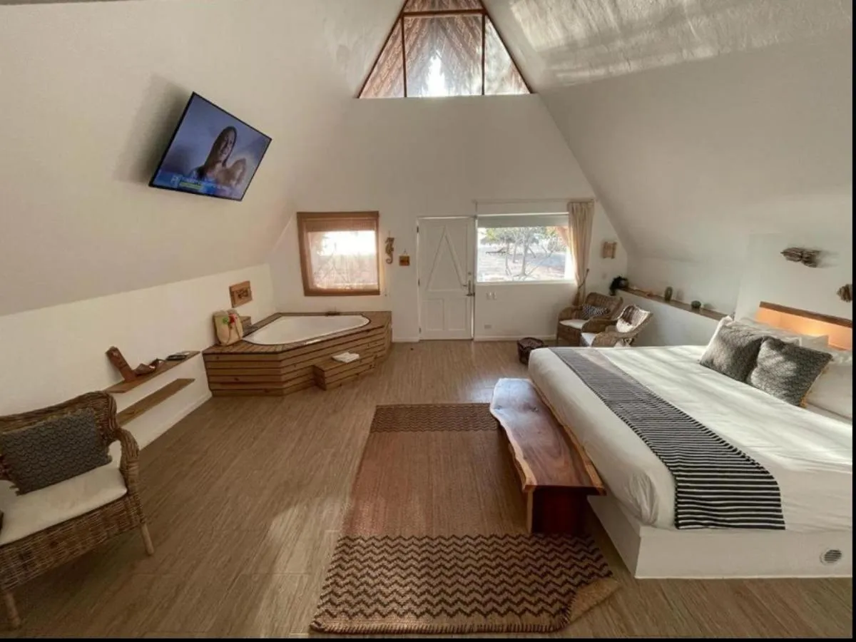 Photo of the whole room, Bed in Punta Rucia Lodge Hotel Boutique & Spa