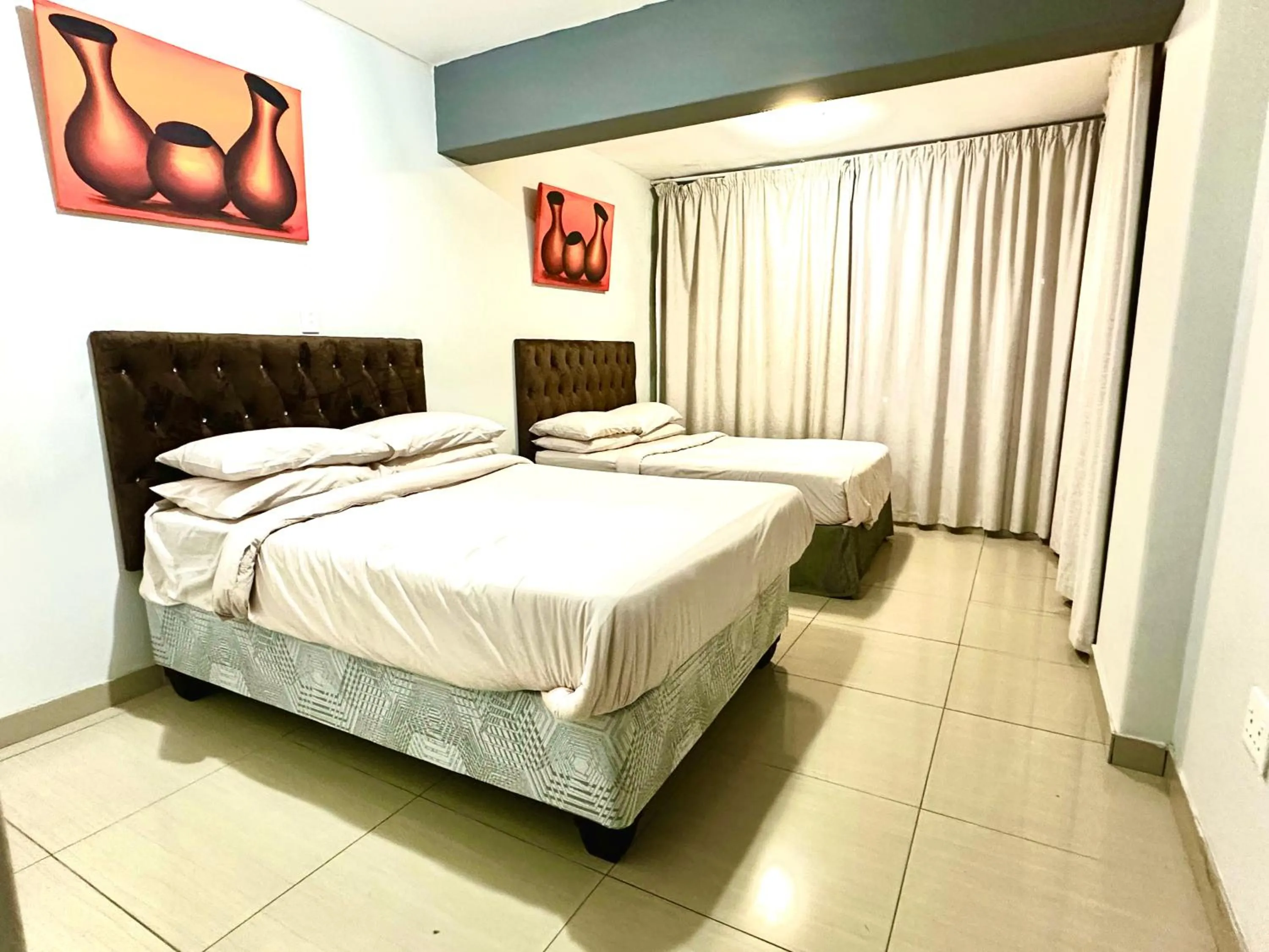 Bed in Sandz accomodation at 108