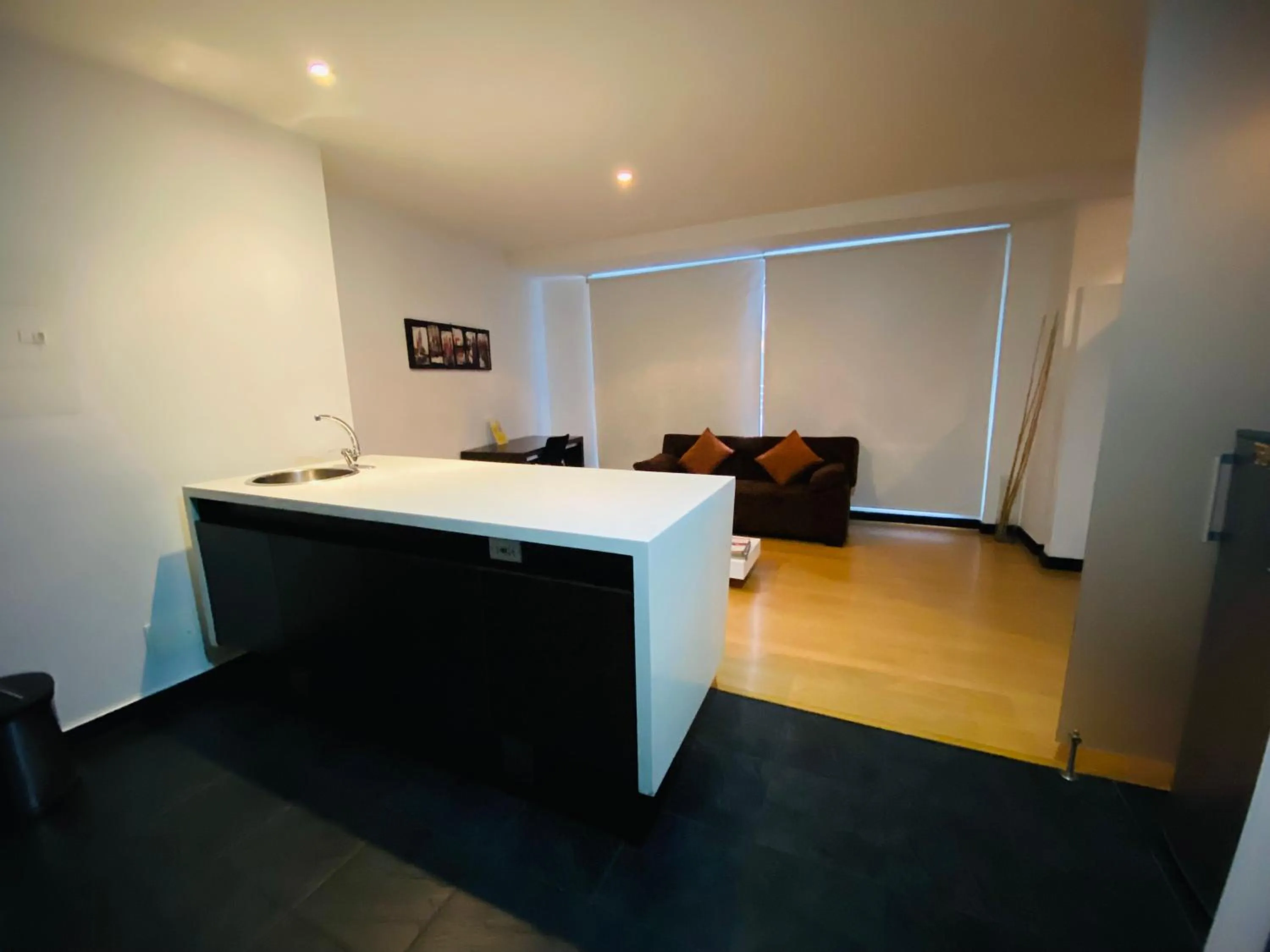 Dining area, Bed in Aparta Suite Continental Bogotá