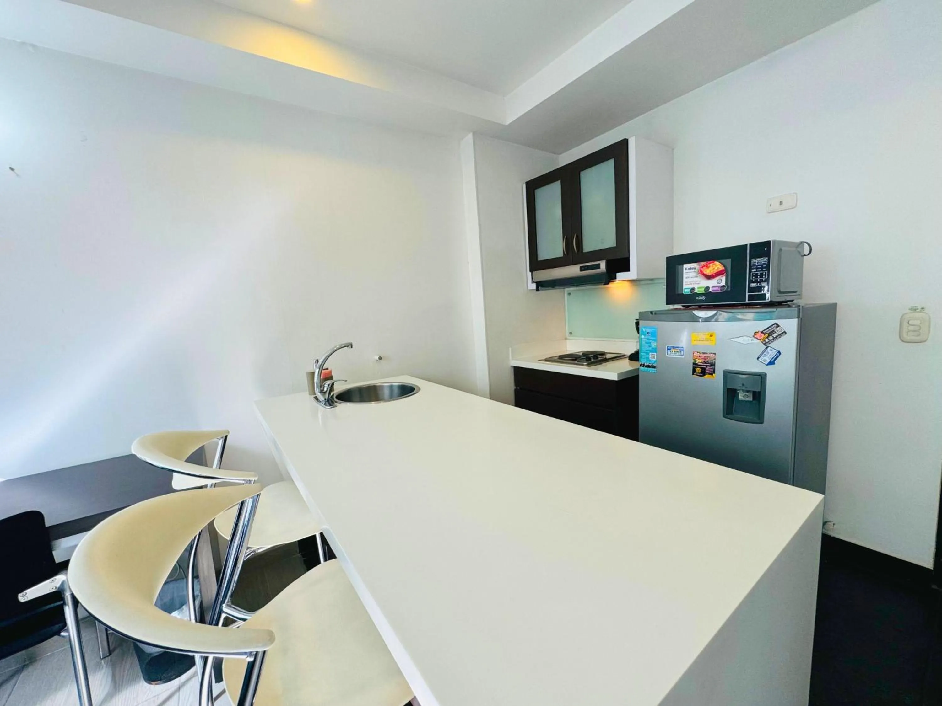 Kitchen or kitchenette in Aparta Suite Continental Bogotá