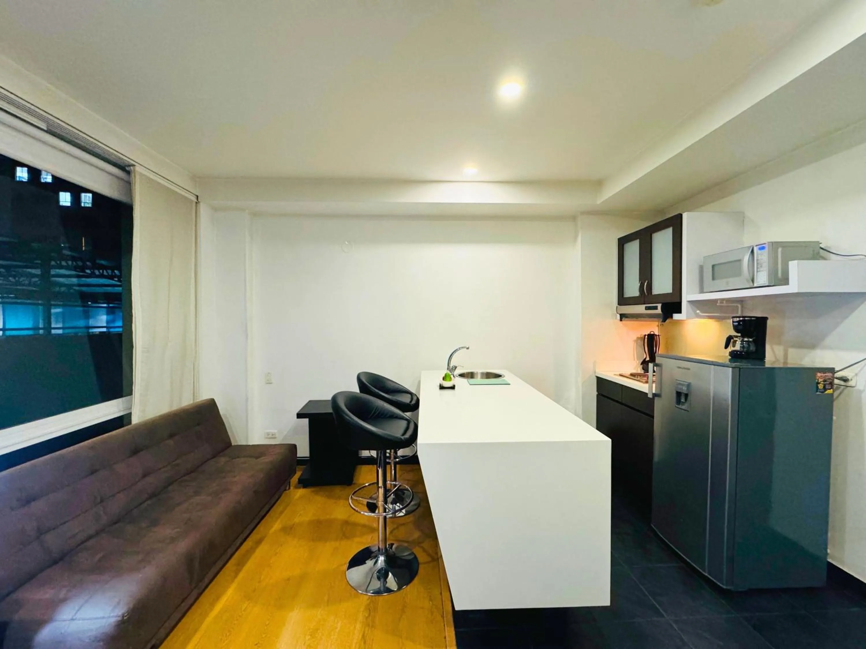 Kitchen or kitchenette in Aparta Suite Continental Bogotá