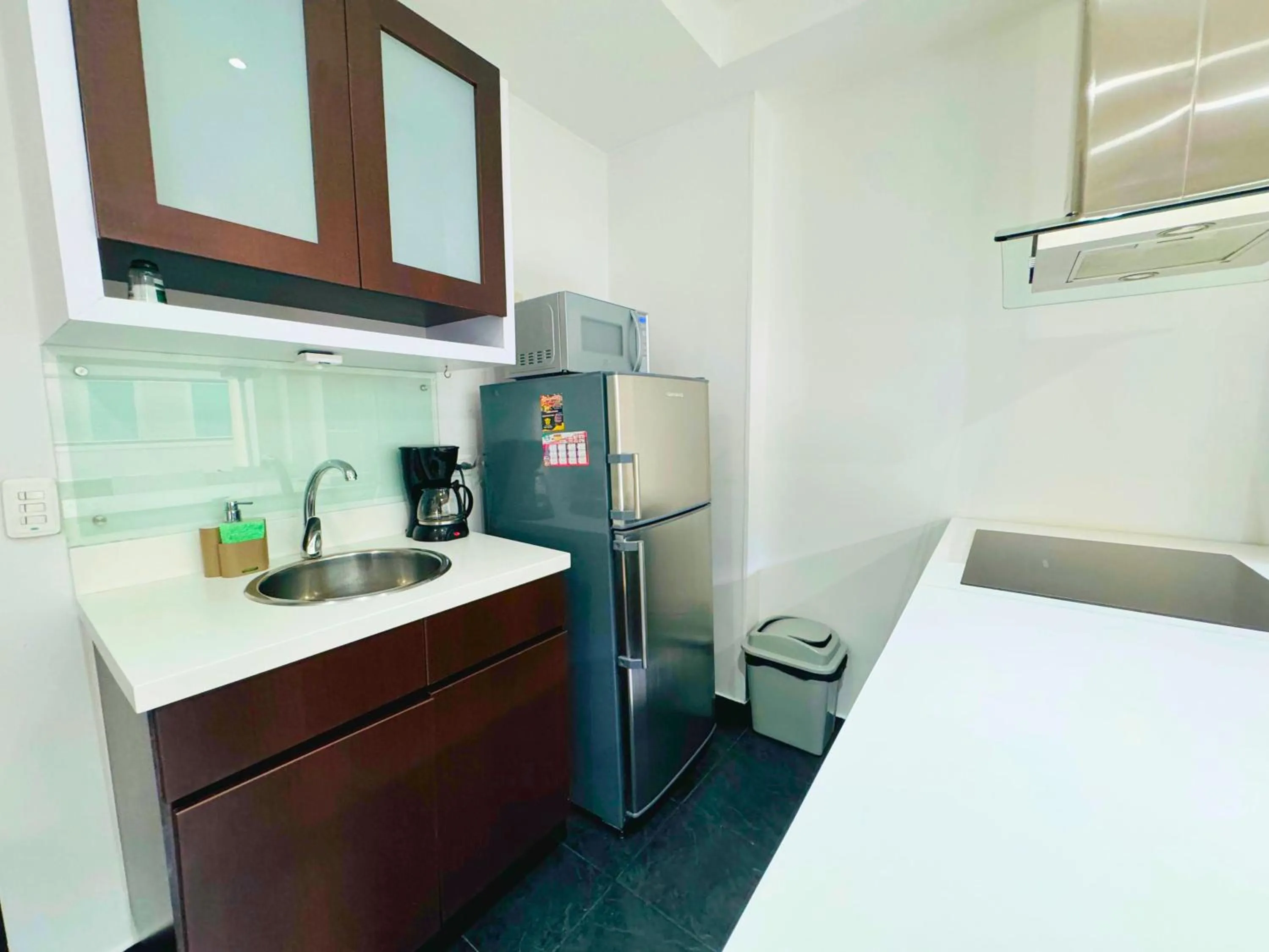 Kitchen or kitchenette, Bed in Aparta Suite Continental Bogotá