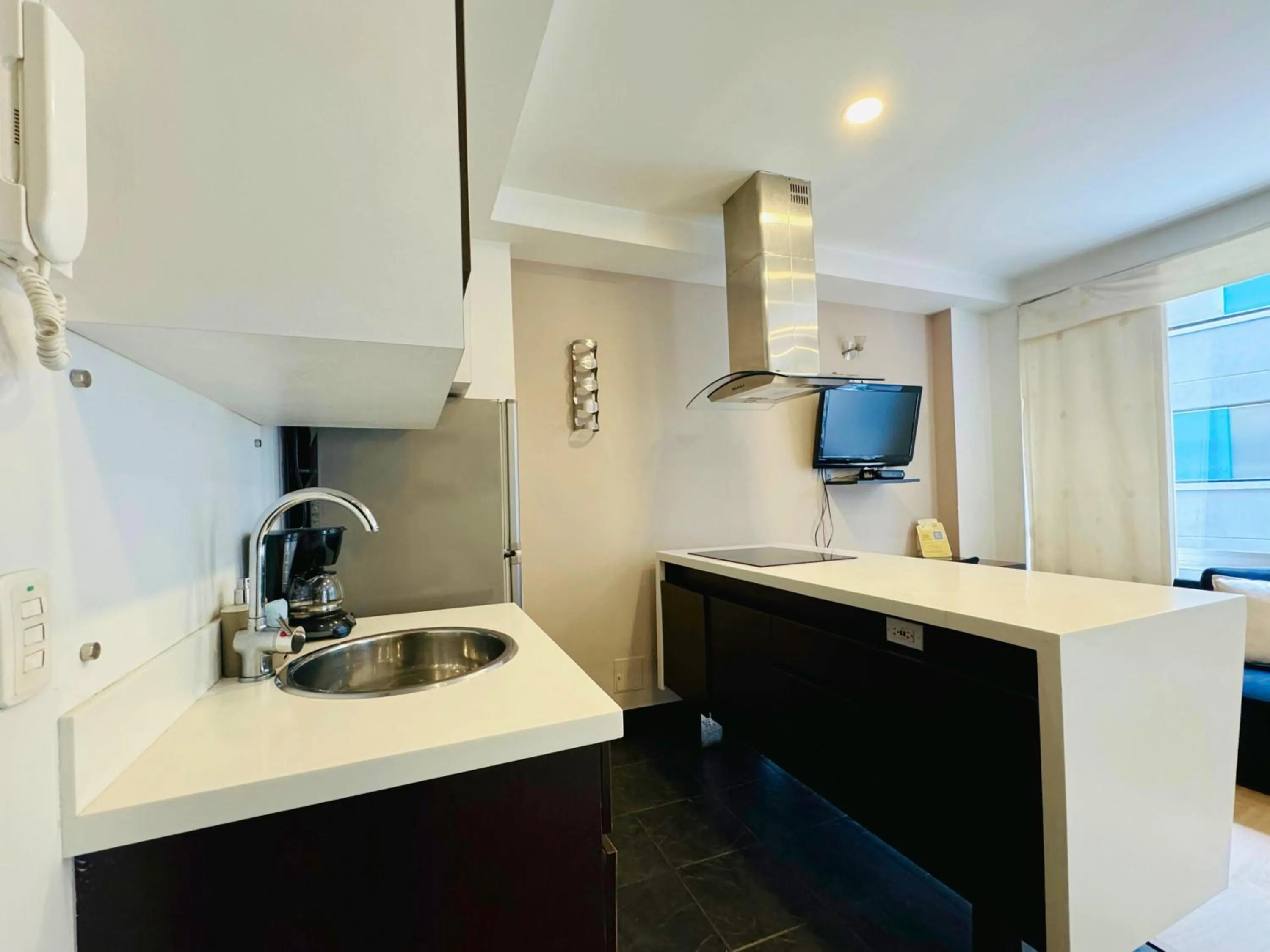 Kitchen or kitchenette in Aparta Suite Continental Bogotá