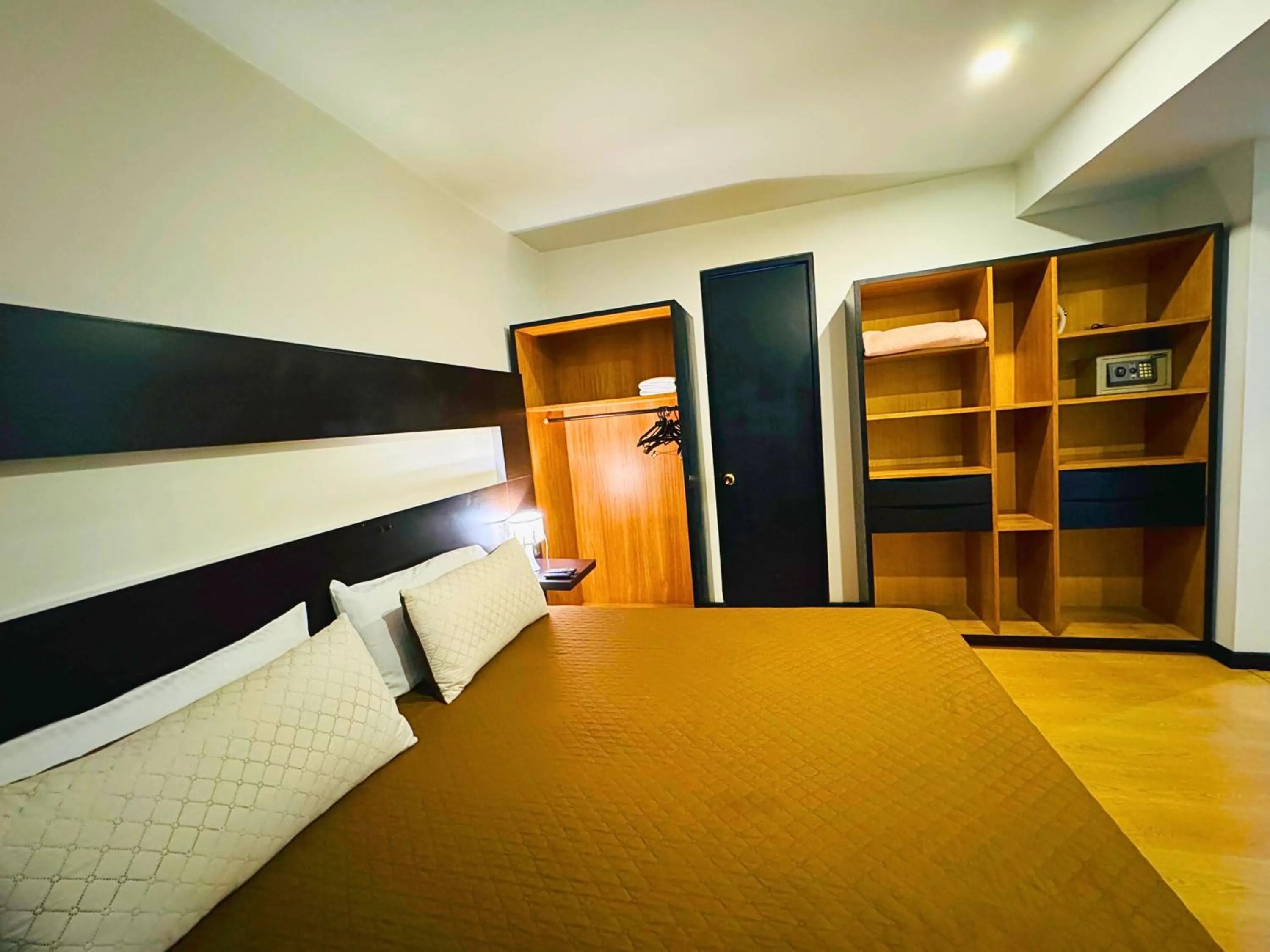 Bed in Aparta Suite Continental Bogotá