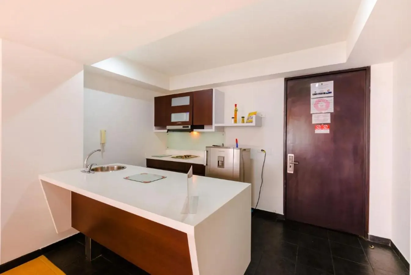 Kitchen or kitchenette in Aparta Suite Continental Bogotá