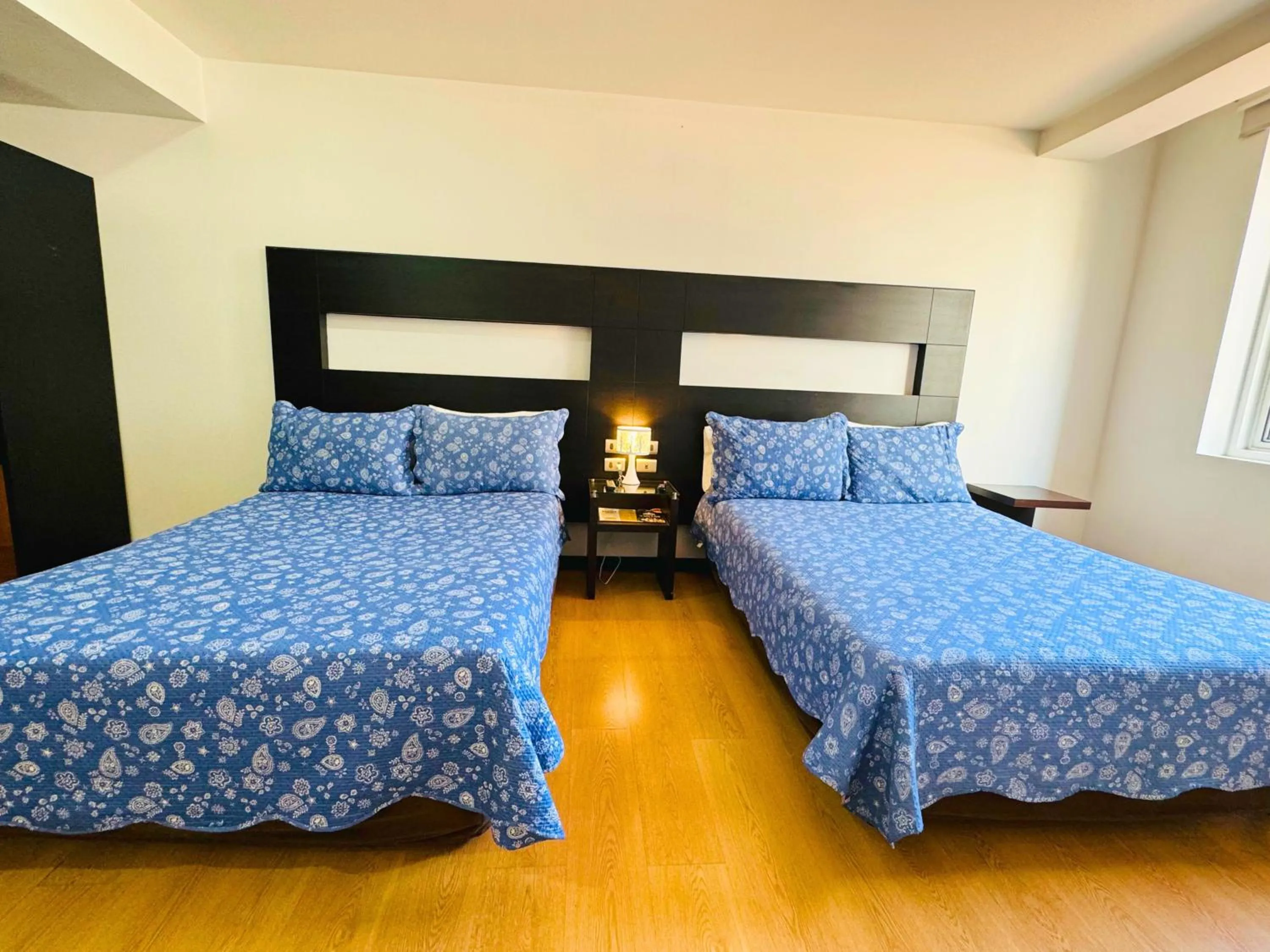 Bed in Aparta Suite Continental Bogotá