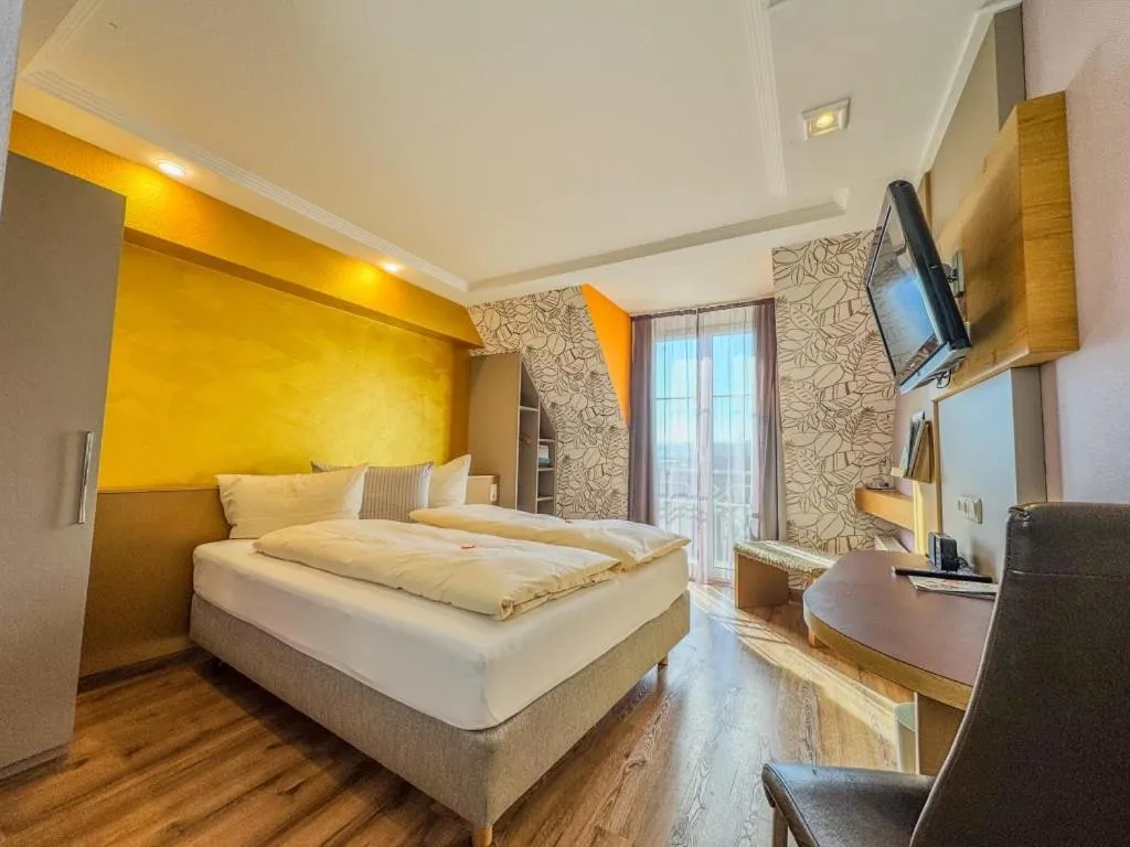 Bed in Flair Hotel Zum Schwarzen Reiter