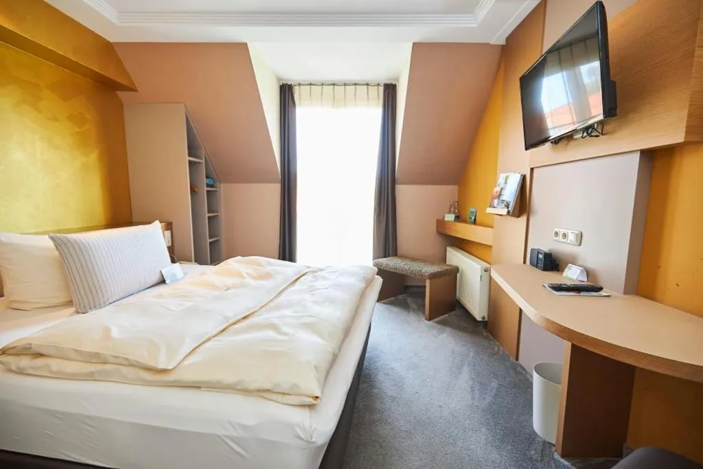 Bed in Flair Hotel Zum Schwarzen Reiter