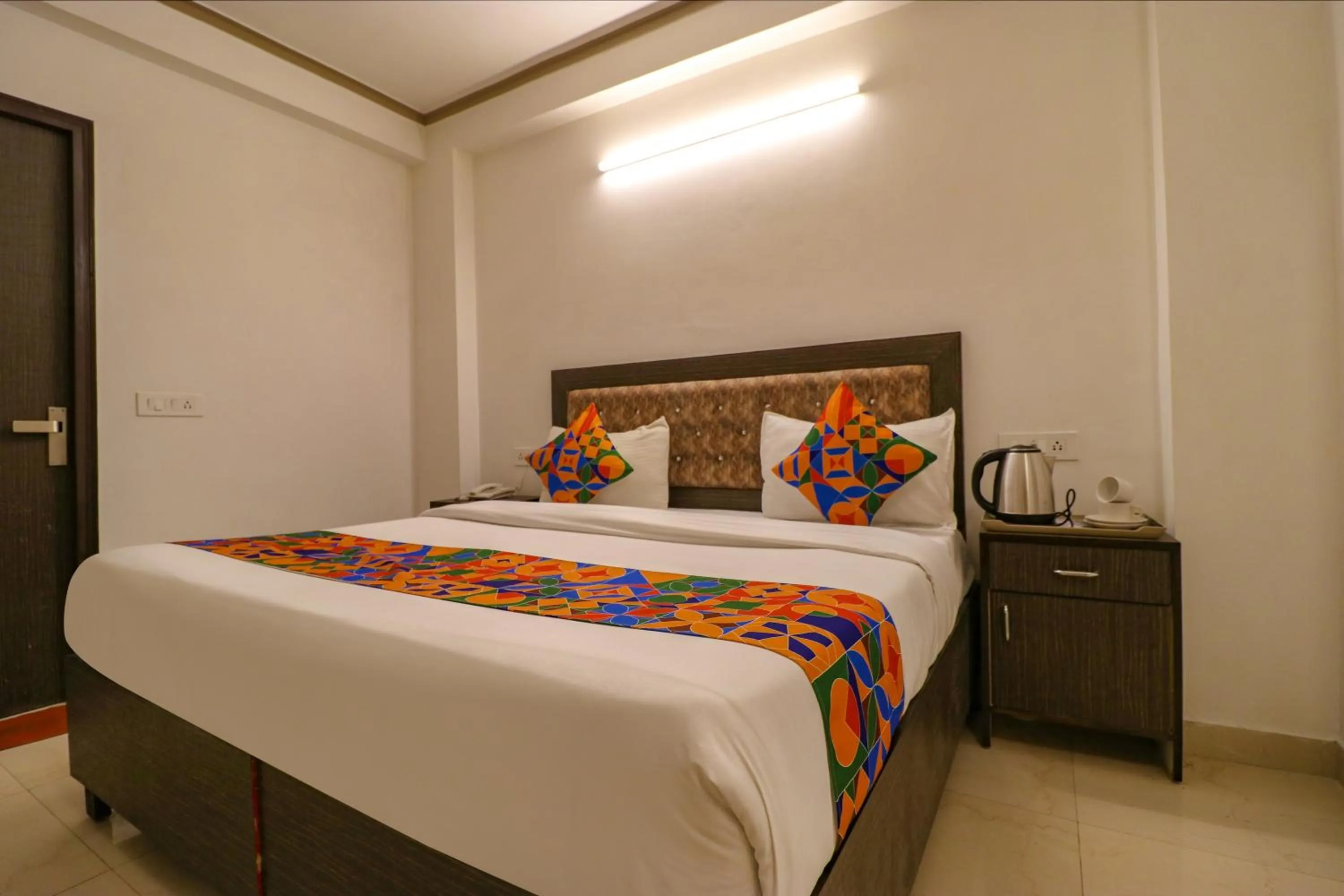 Bed in FabHotel Dolphin International - Nr IGI Airport New Delhi