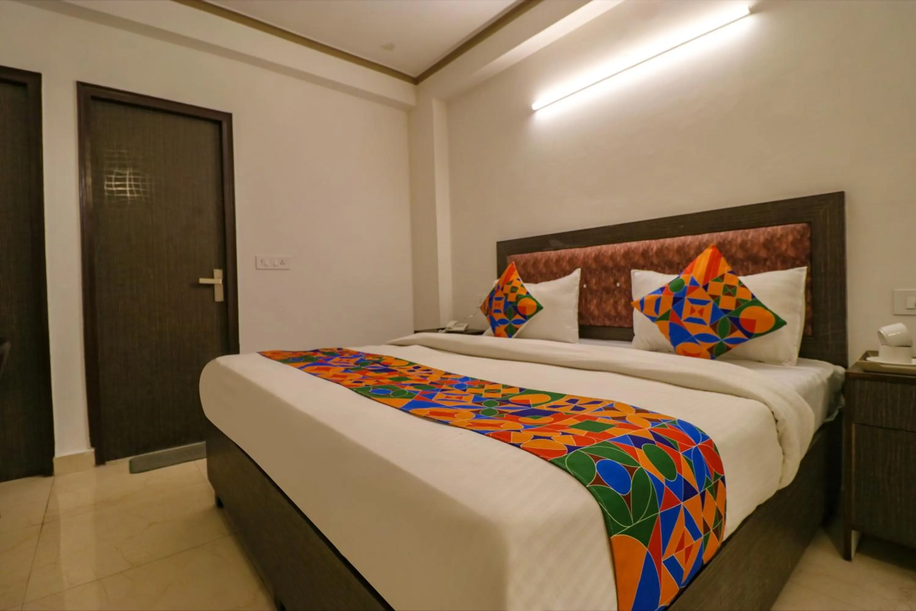 Bed in FabHotel Dolphin International - Nr IGI Airport New Delhi