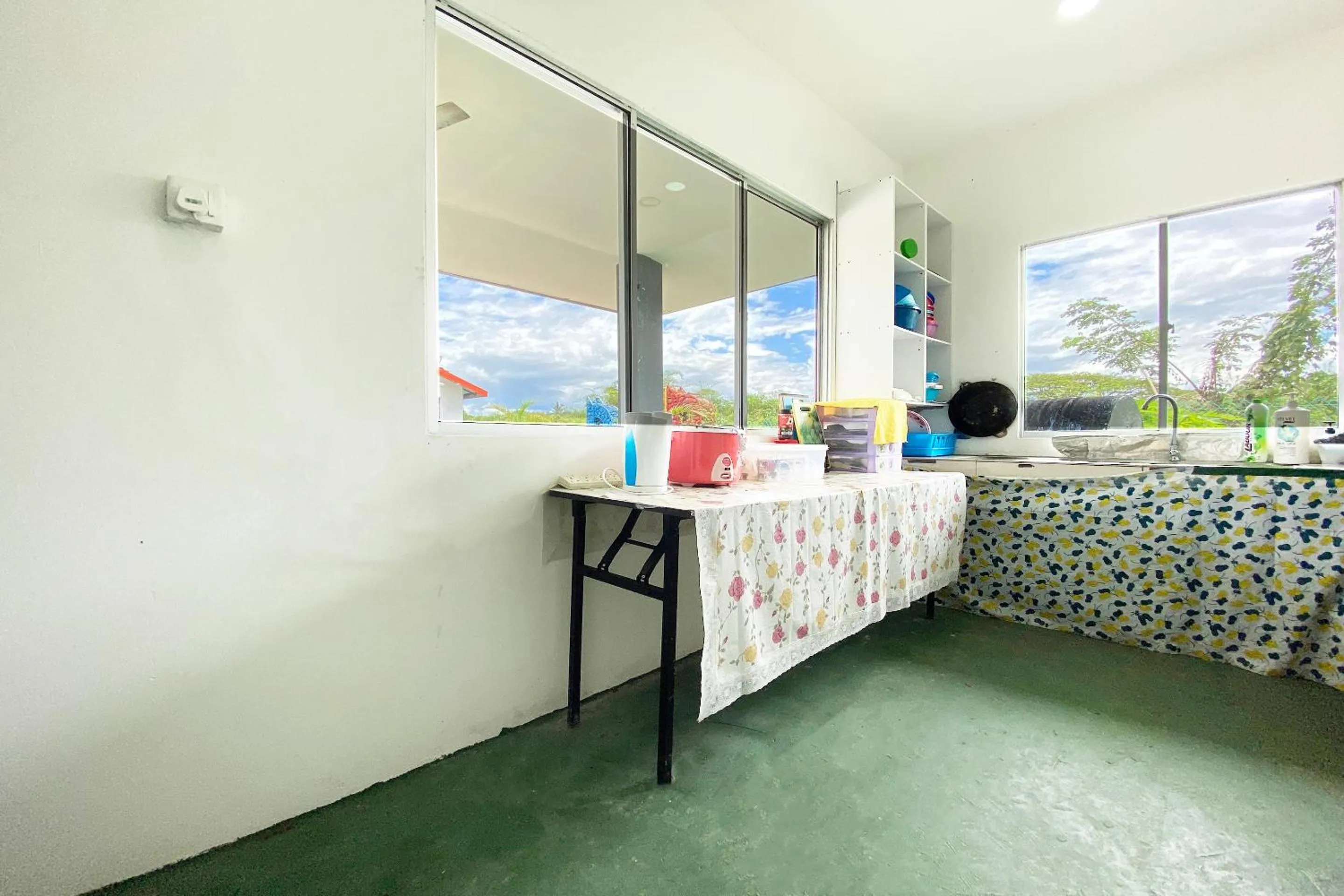 Kitchen or kitchenette in Hotel O Dh Residence