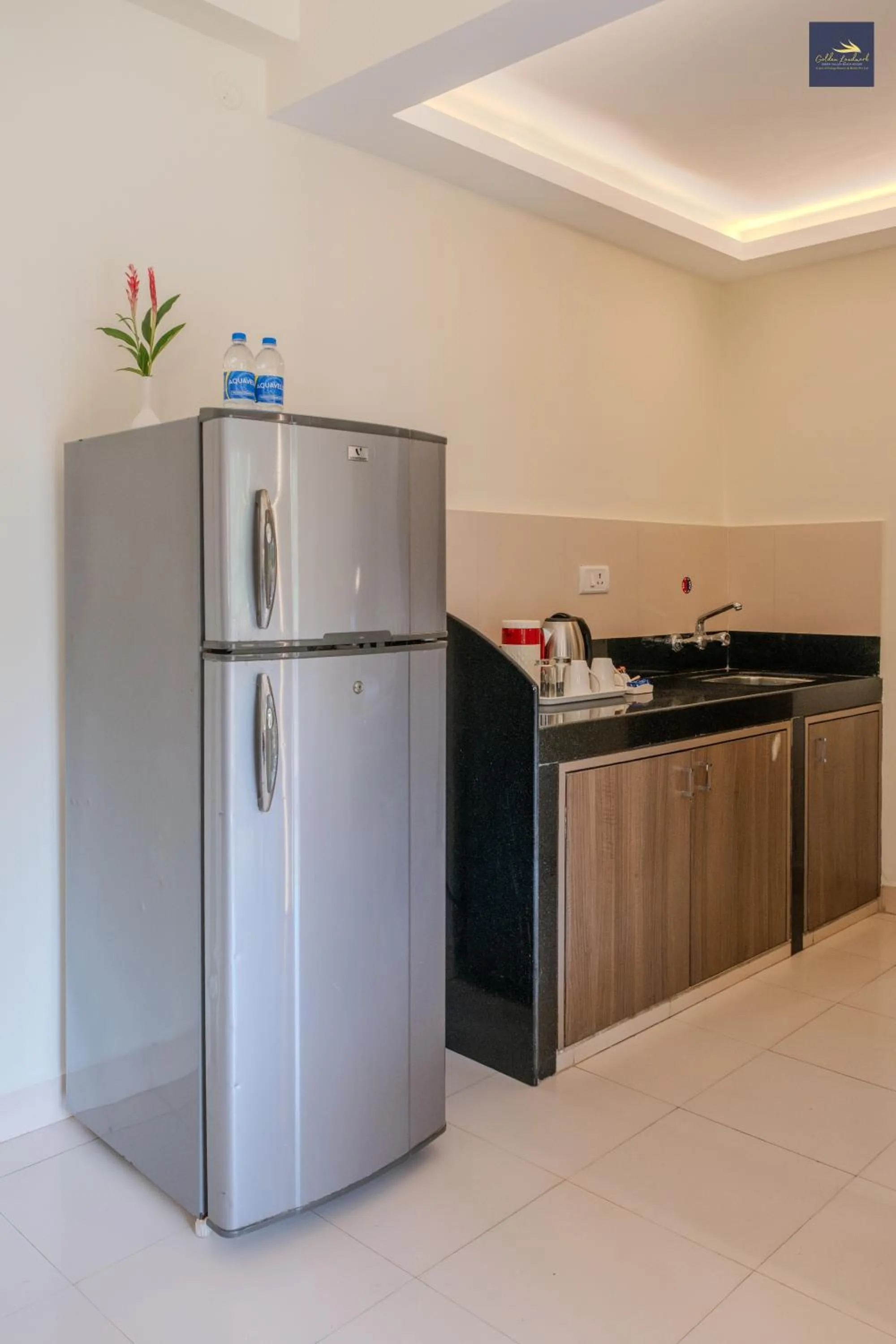Kitchen or kitchenette in Golden Landmark Green Valley Beach Resort