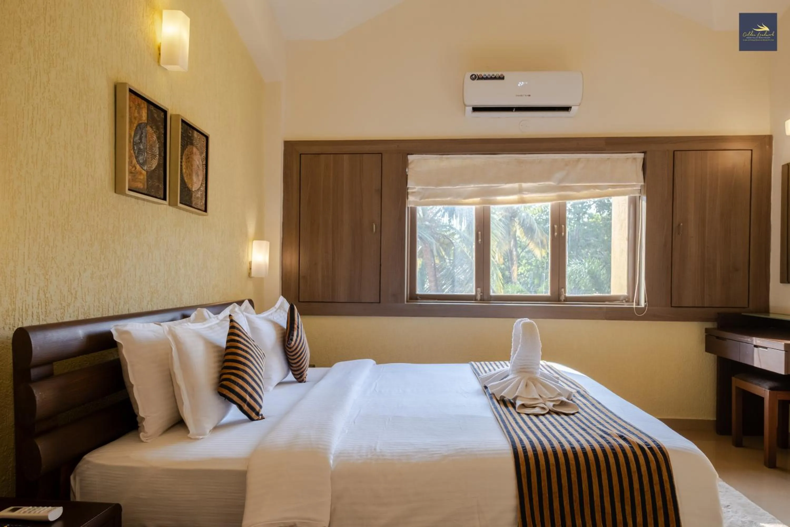 Bed in Golden Landmark Green Valley Beach Resort