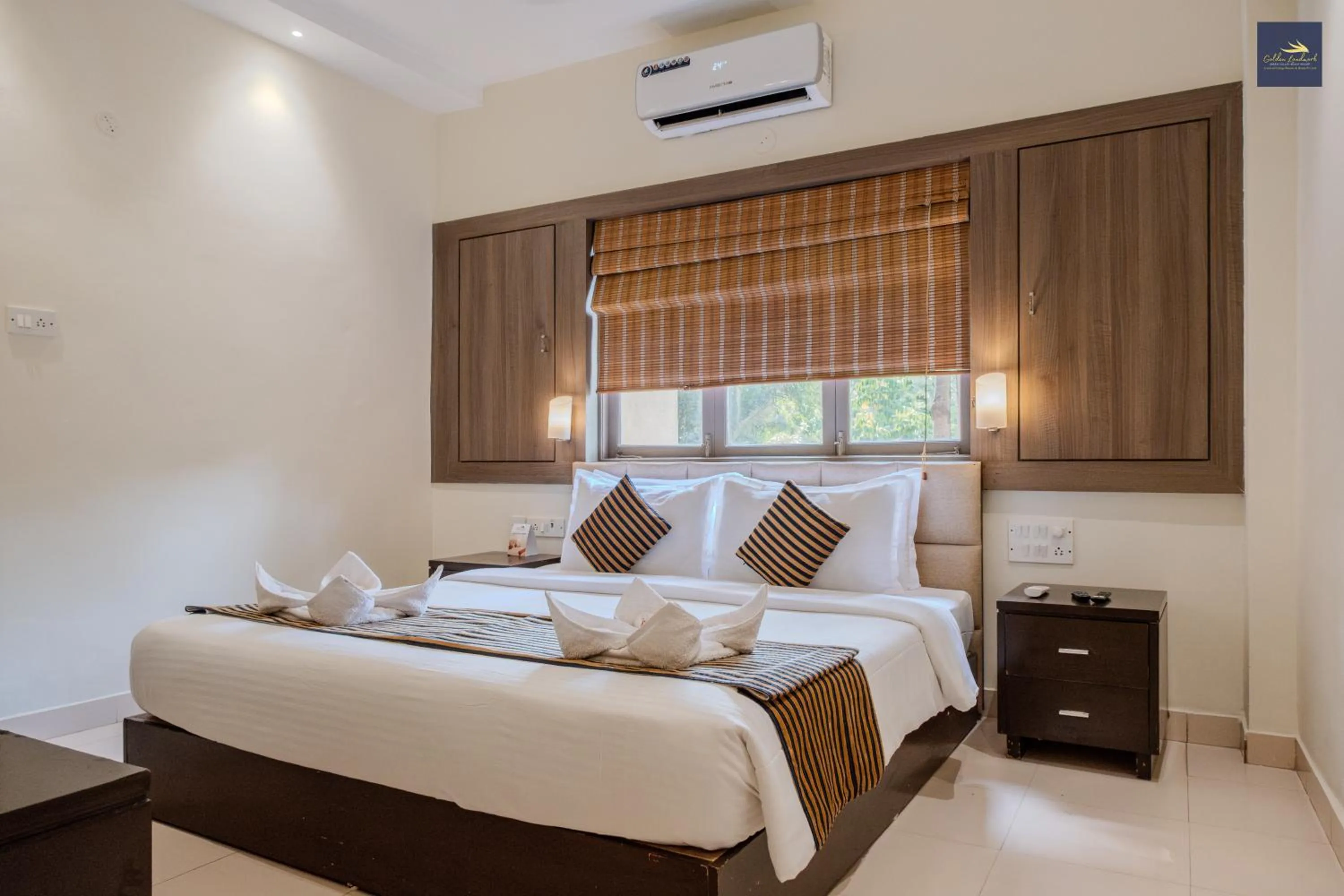 Bed in Golden Landmark Green Valley Beach Resort