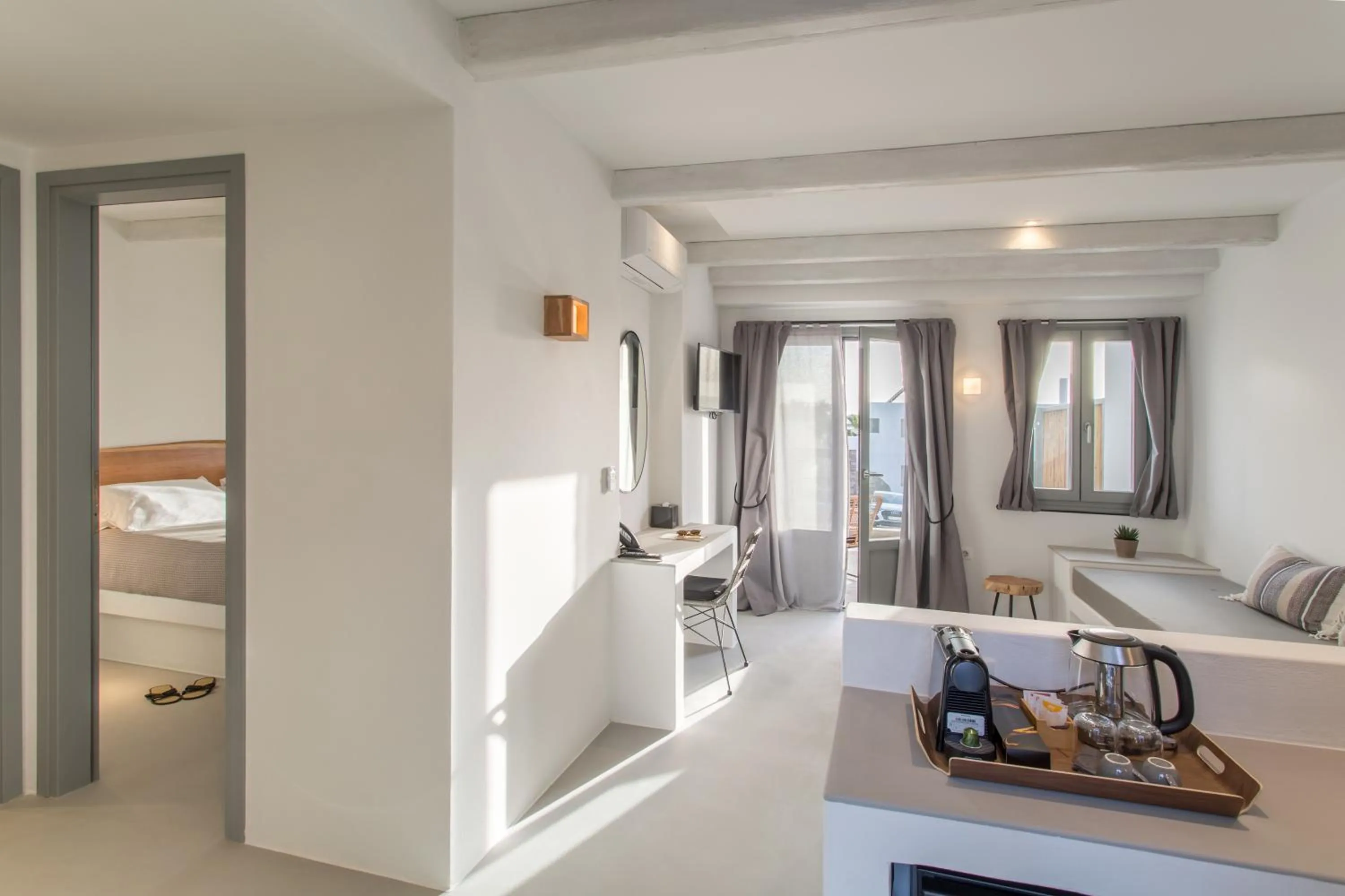 Bed in Paros Cape Suites