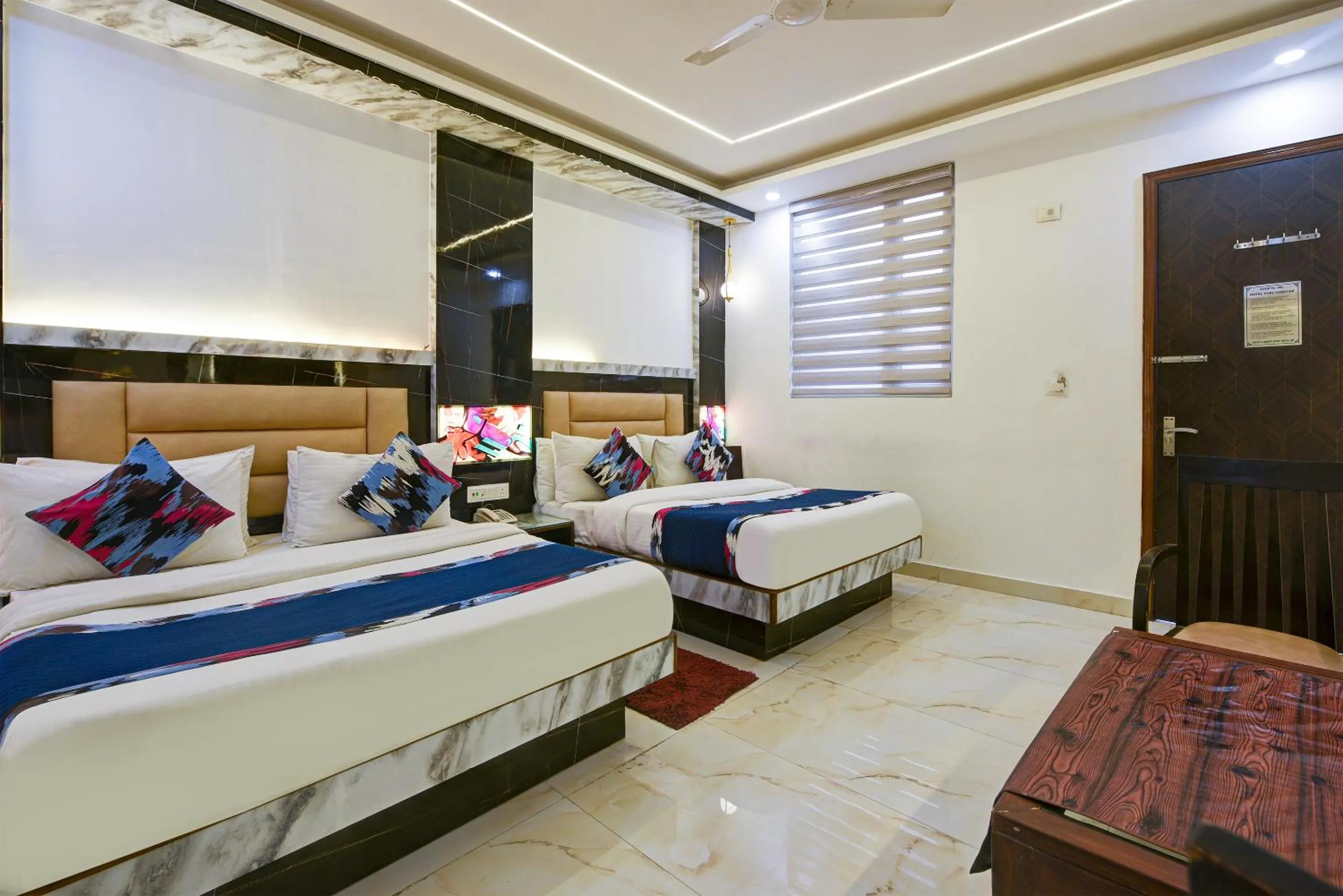 Photo of the whole room, Bed in Hotel Shri Vinayak in City Centre at New Delhi Railway Station-By RCG Hotels