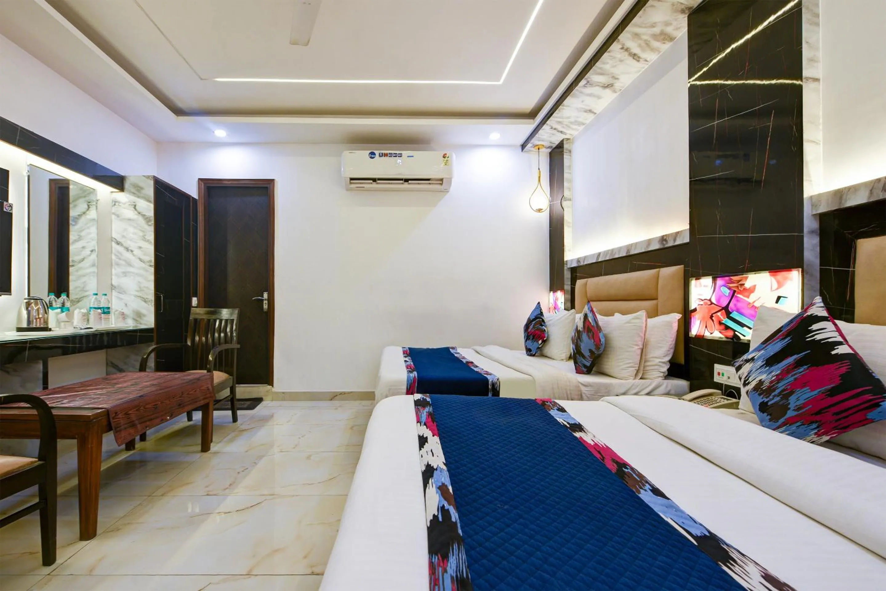 Photo of the whole room, Bed in Hotel Shri Vinayak in City Centre at New Delhi Railway Station-By RCG Hotels