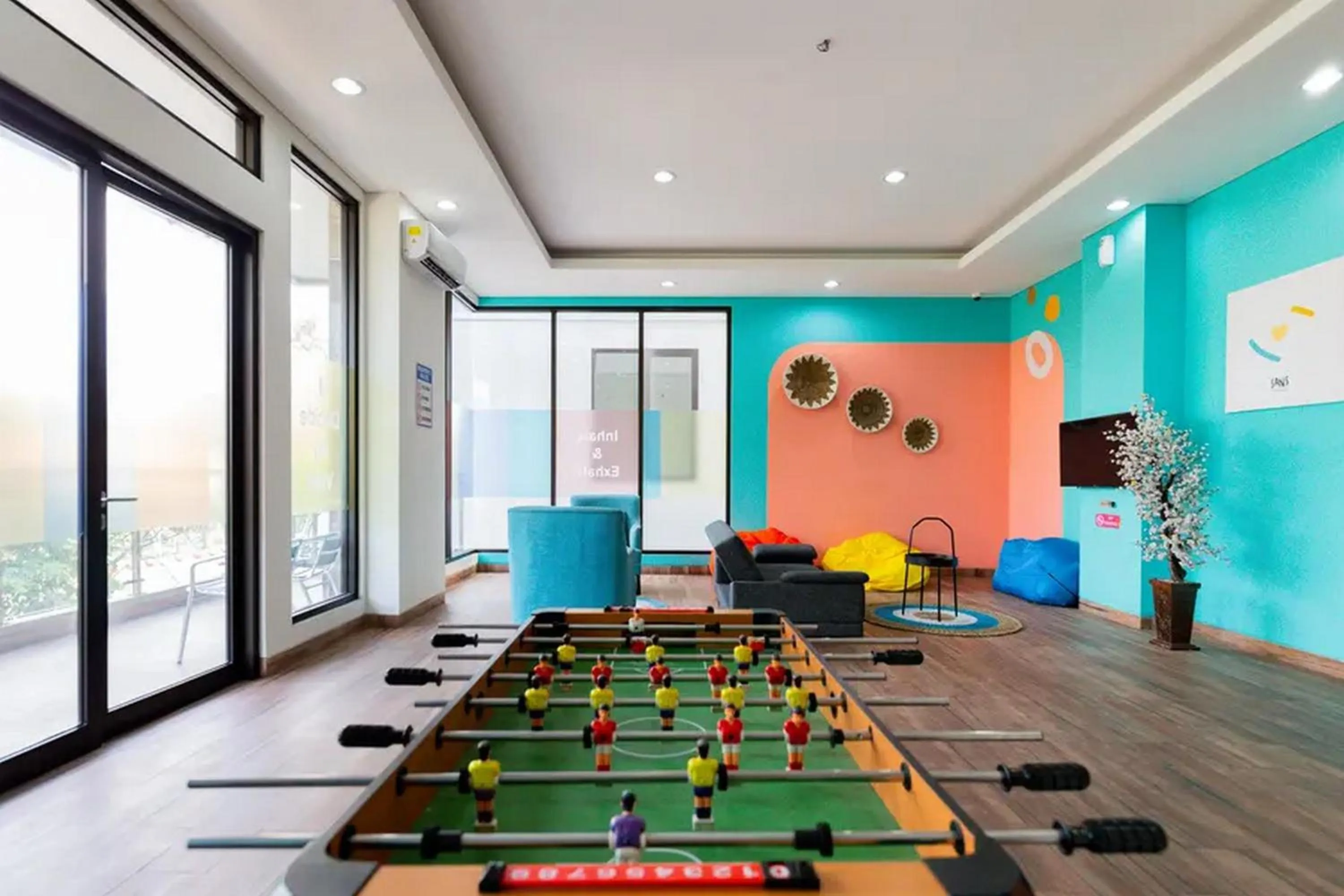 Game Room in Sans Hotel Rajawali Surabaya by RedDoorz