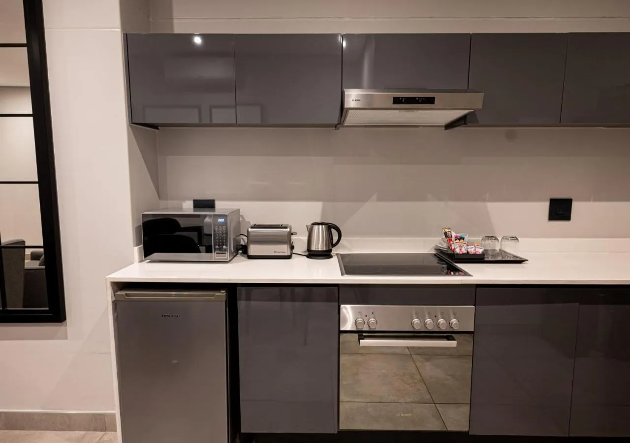 stove in The Catalyst Apartment Hotel by NEWMARK
