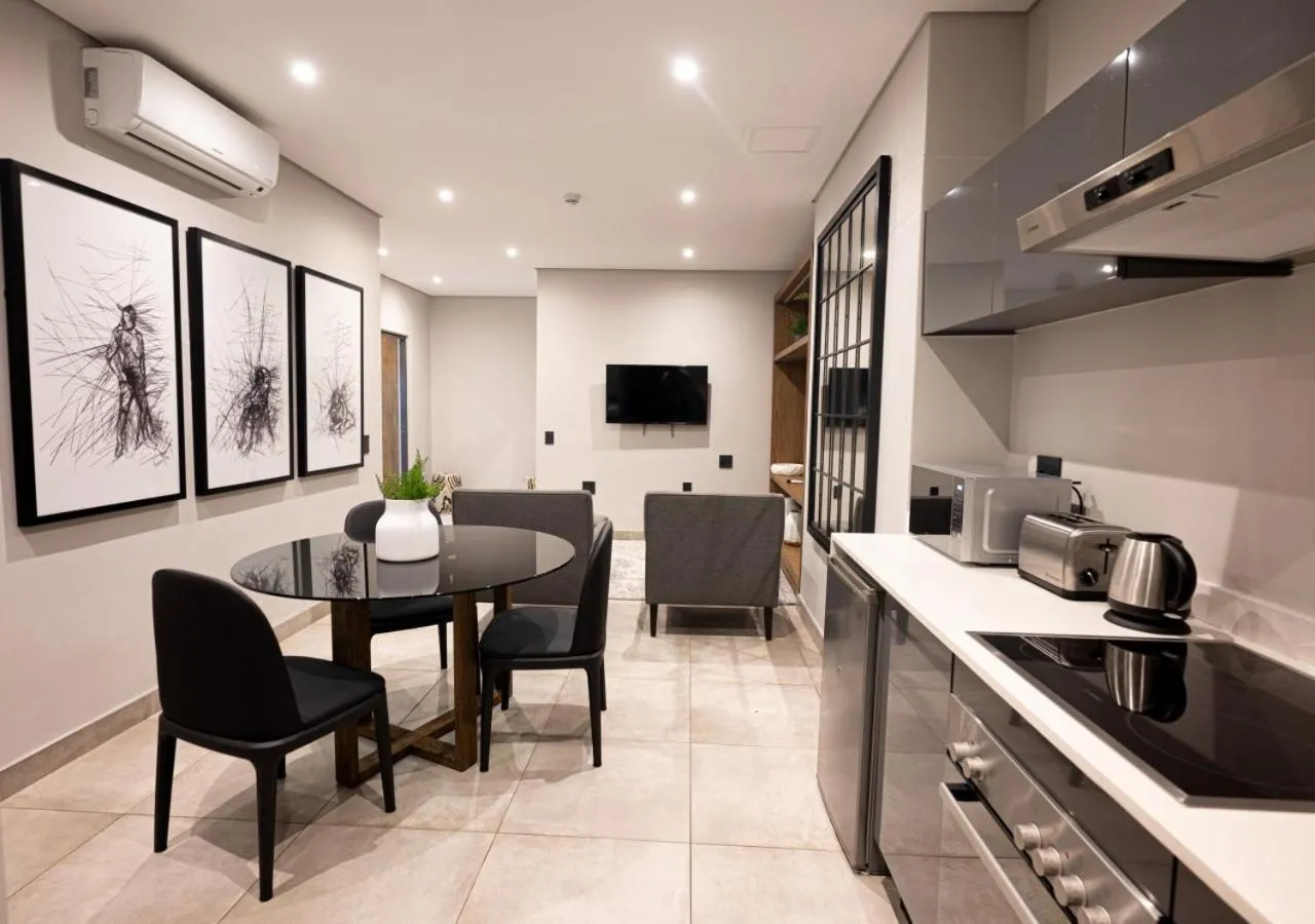 kitchen in The Catalyst Apartment Hotel by NEWMARK