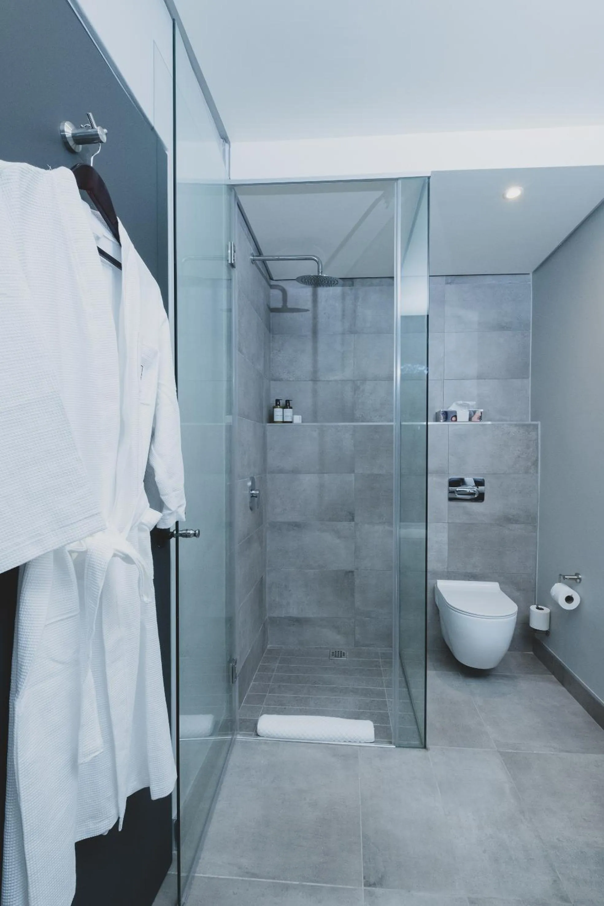 Shower in The Catalyst Apartment Hotel by NEWMARK
