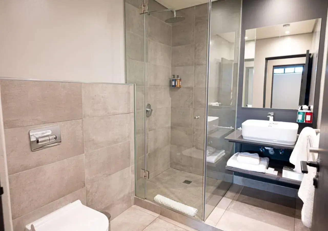Bathroom in The Catalyst Apartment Hotel by NEWMARK Bathroom in The Catalyst Apartment Hotel by NEWMARK