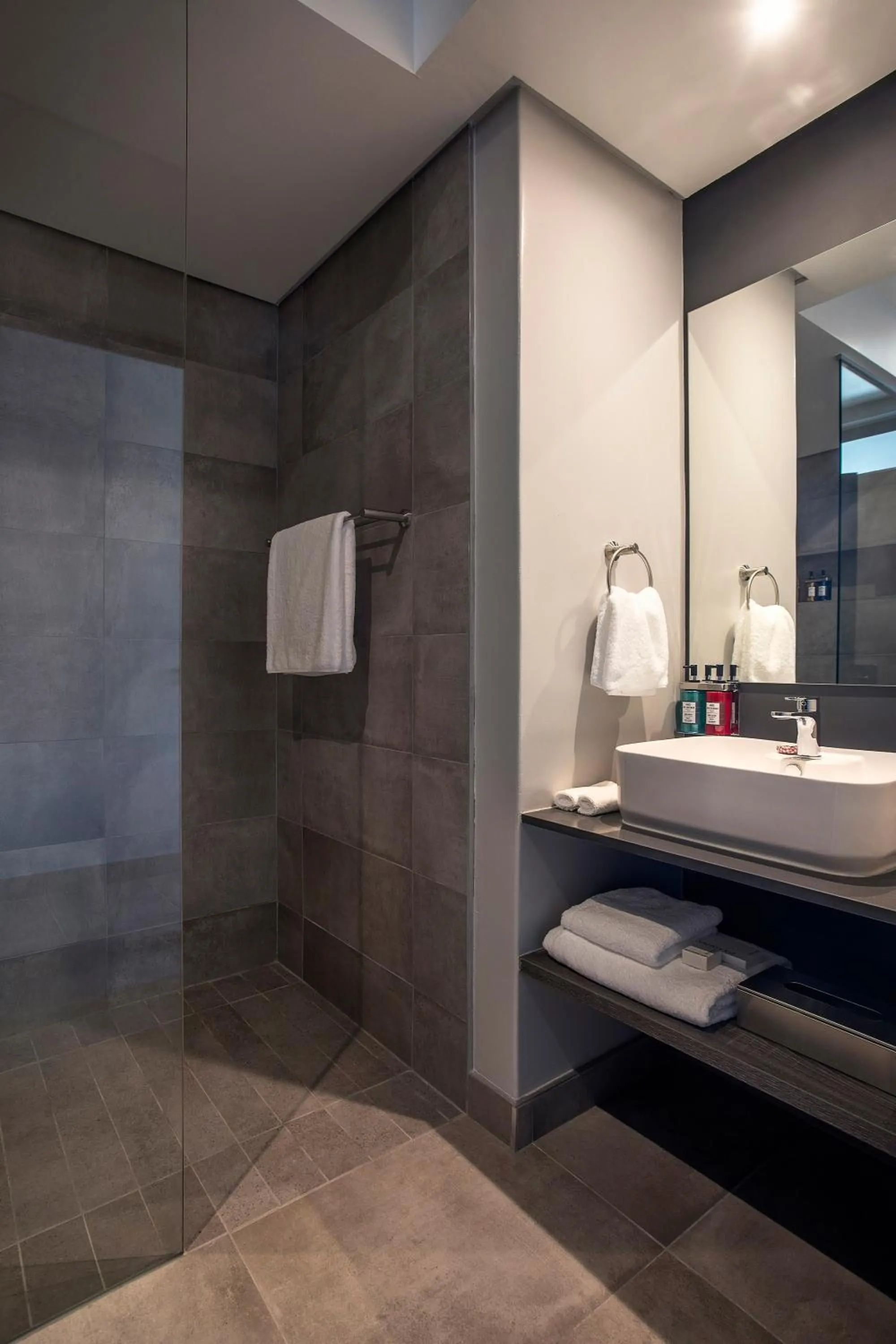 Shower in The Catalyst Apartment Hotel by NEWMARK