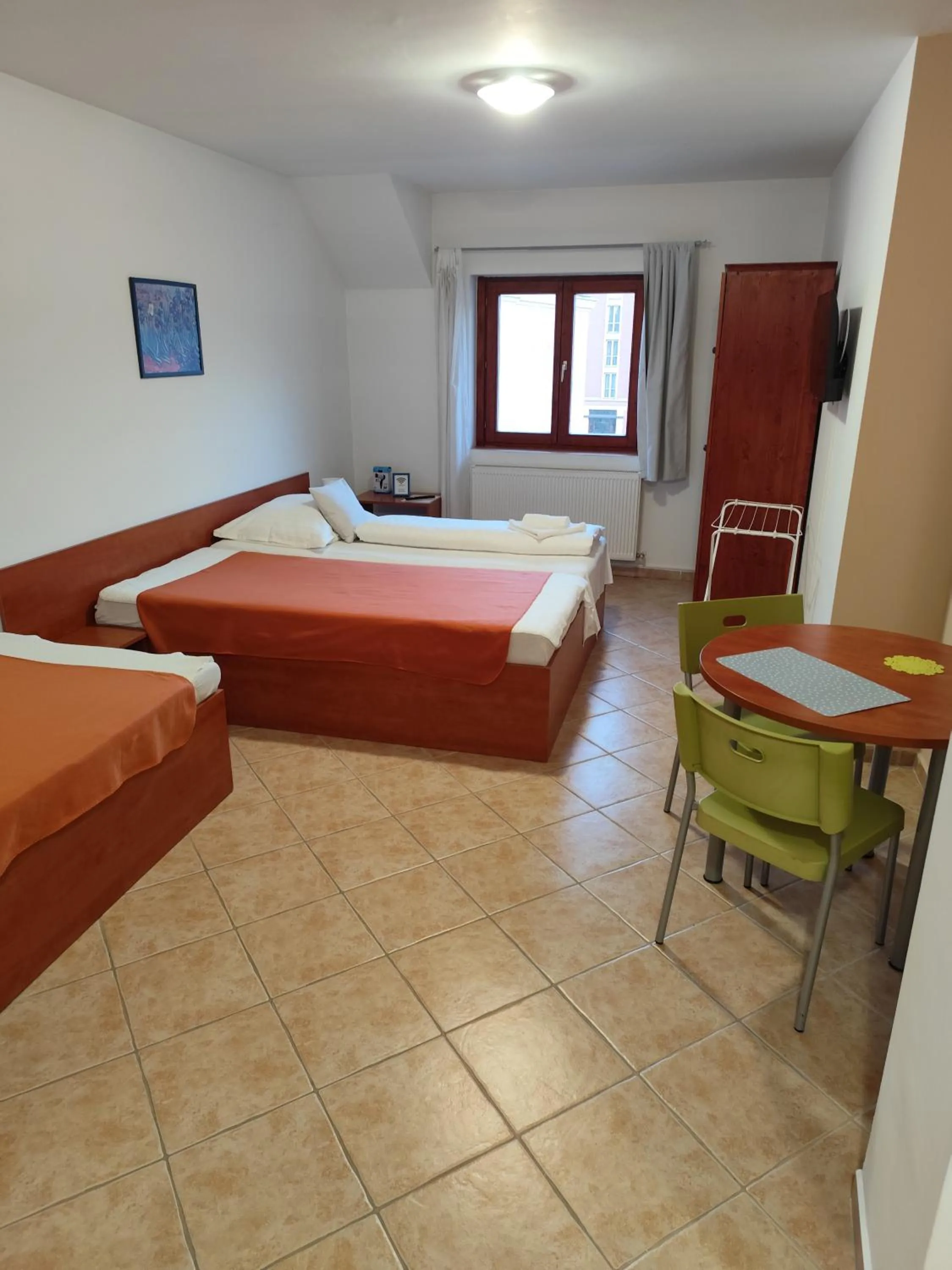 Bed in Szent Kristóf Apartmanhotel