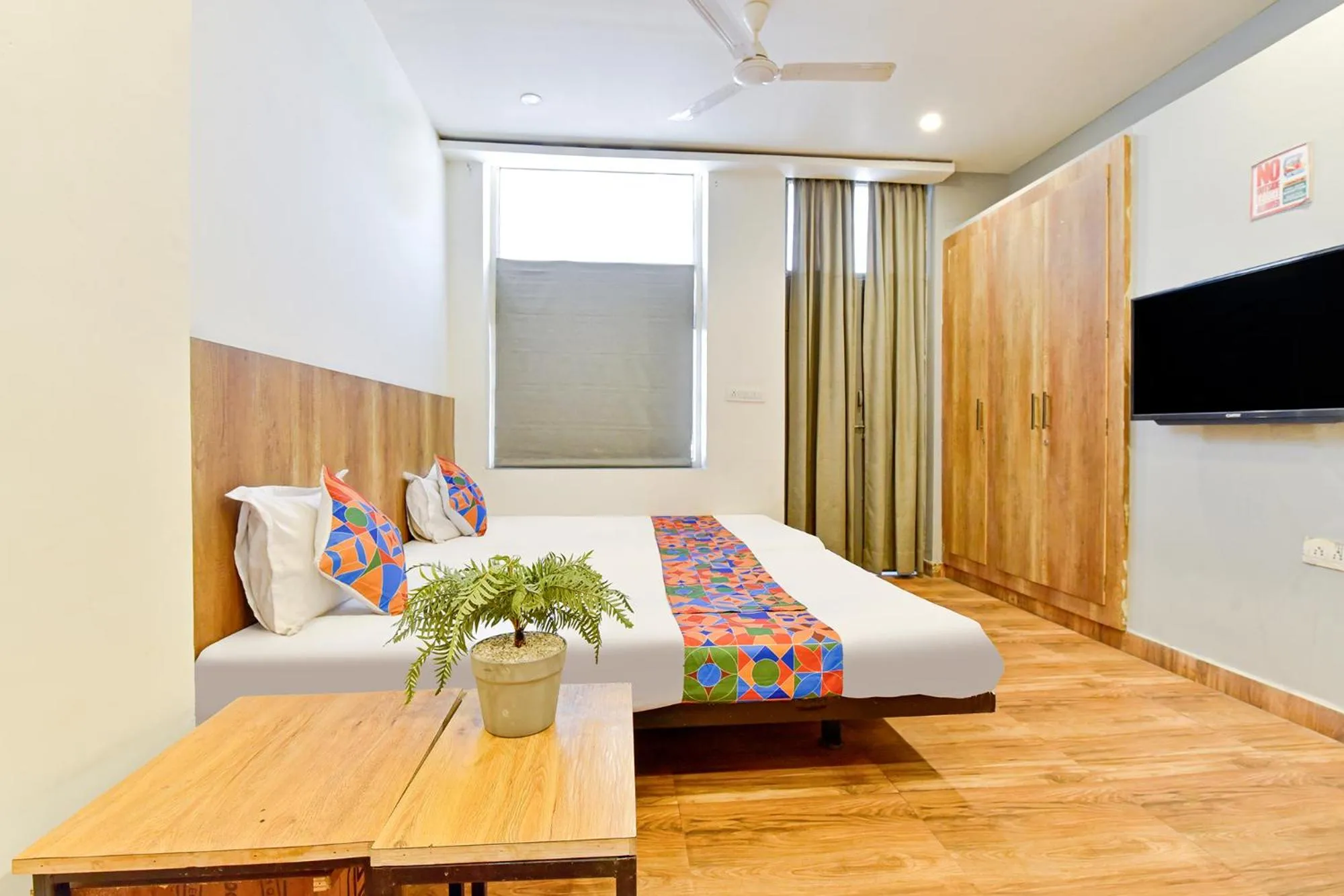 Bed in OYO 79651 TownHouse OTH Buddhi
