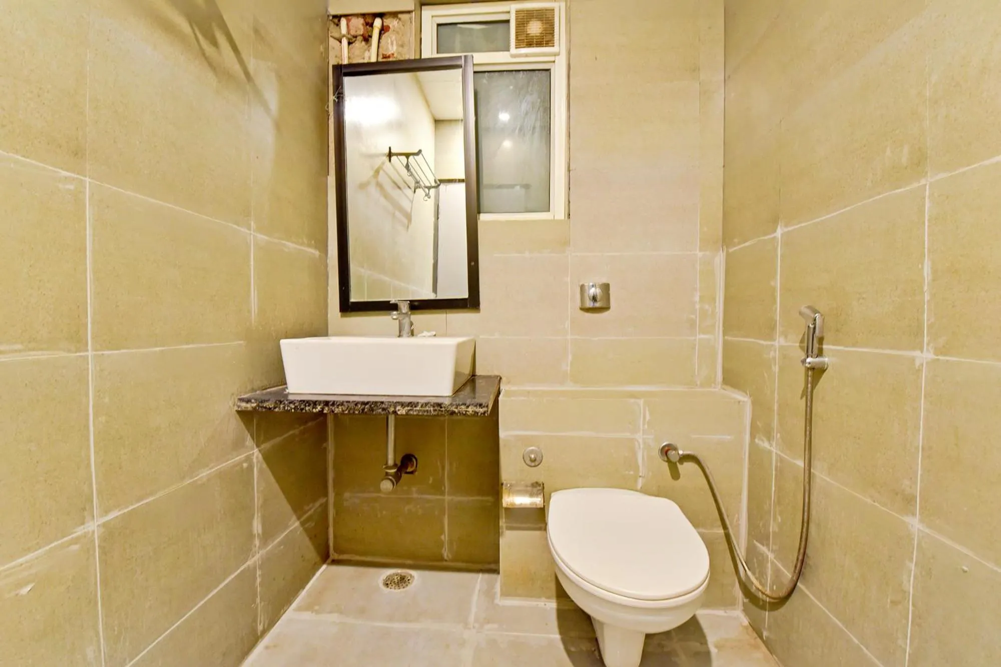 Bathroom in OYO 79651 TownHouse OTH Buddhi