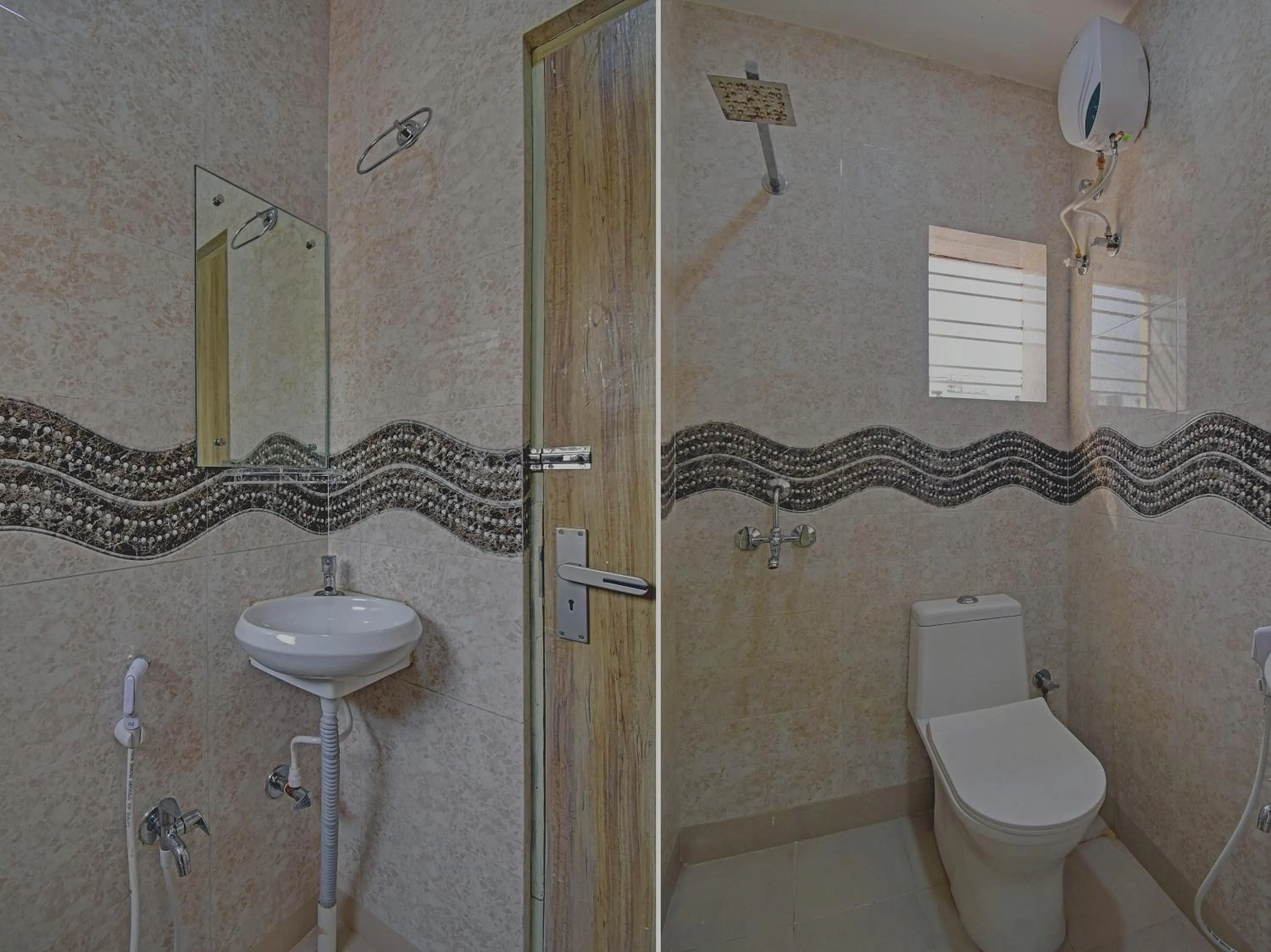 Bathroom in Super Collection O Ketan Regency Near Acropolis Mall