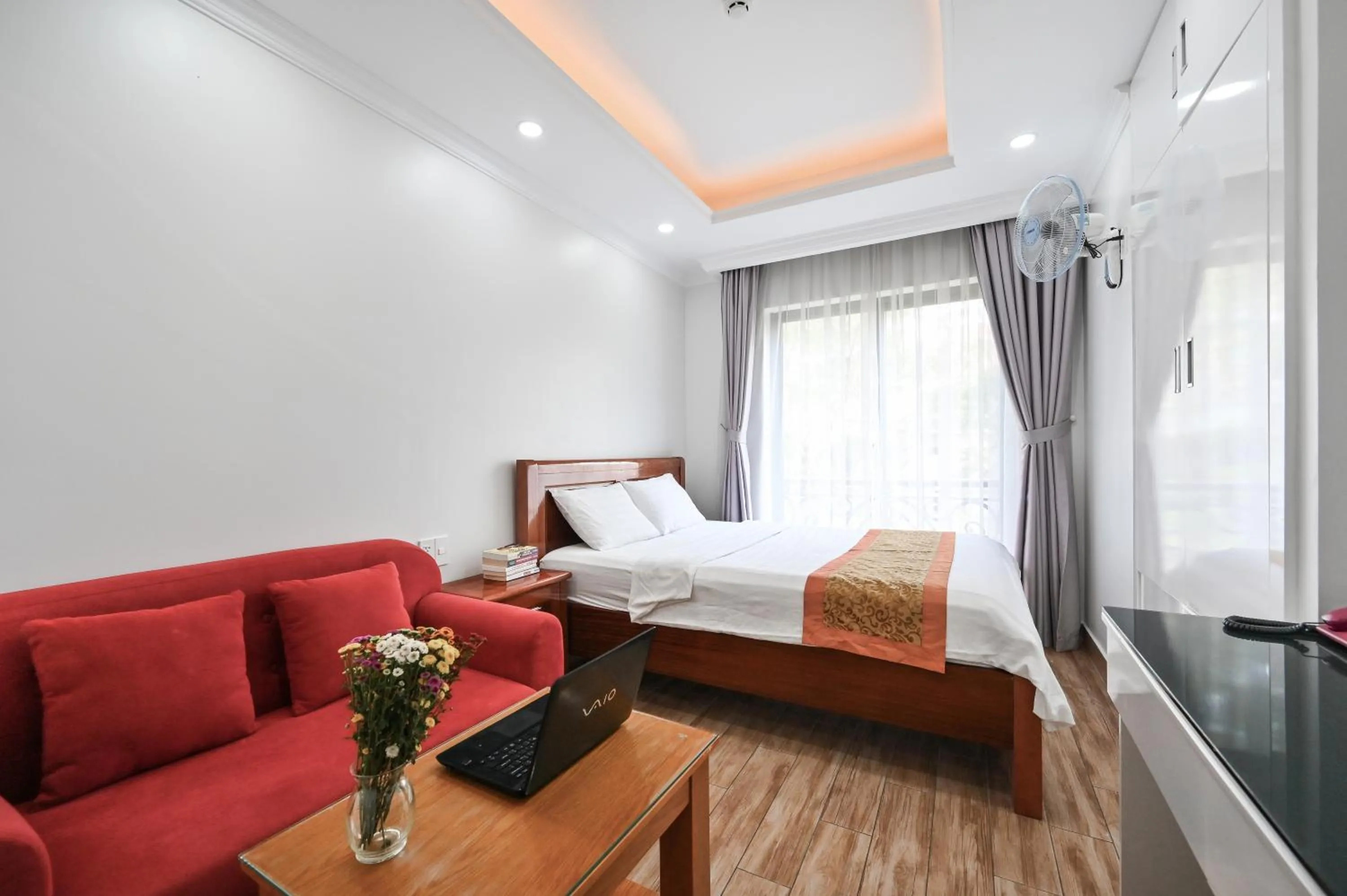 Photo of the whole room, Bed in Genie Hotel & Serviced Apartments