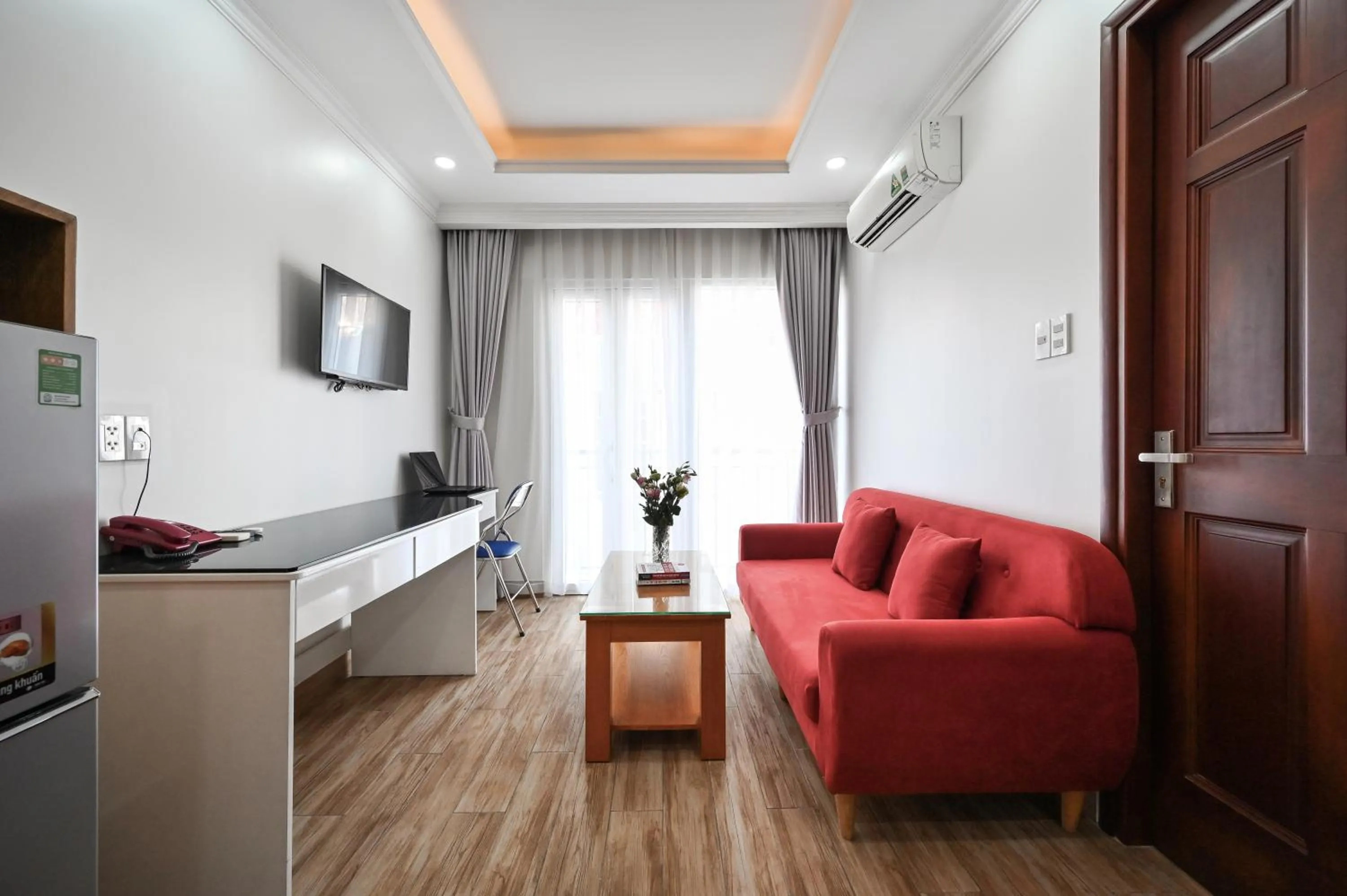 Living room, Bed in Genie Hotel & Serviced Apartments