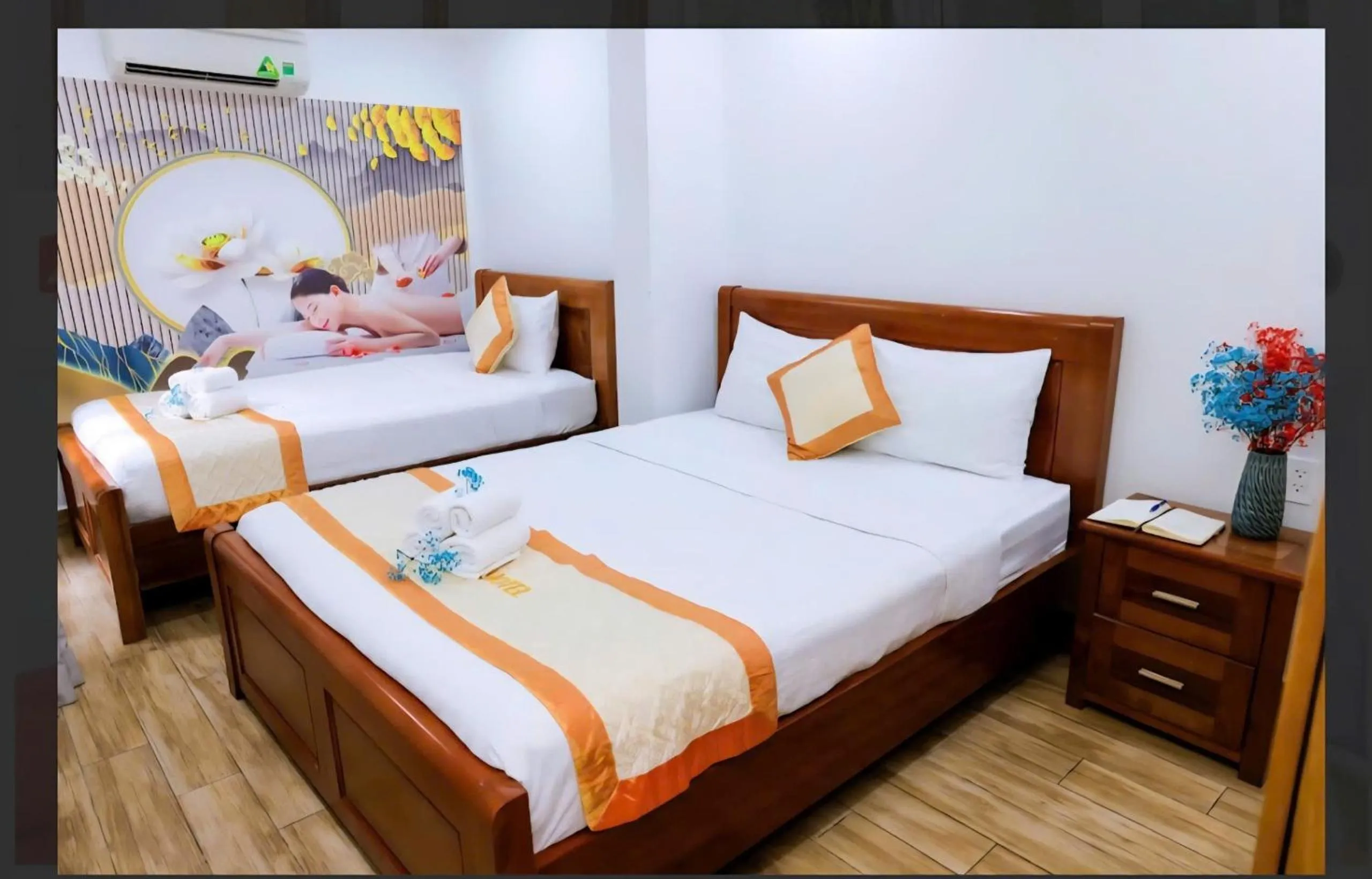 Bed in Genie Hotel & Serviced Apartments