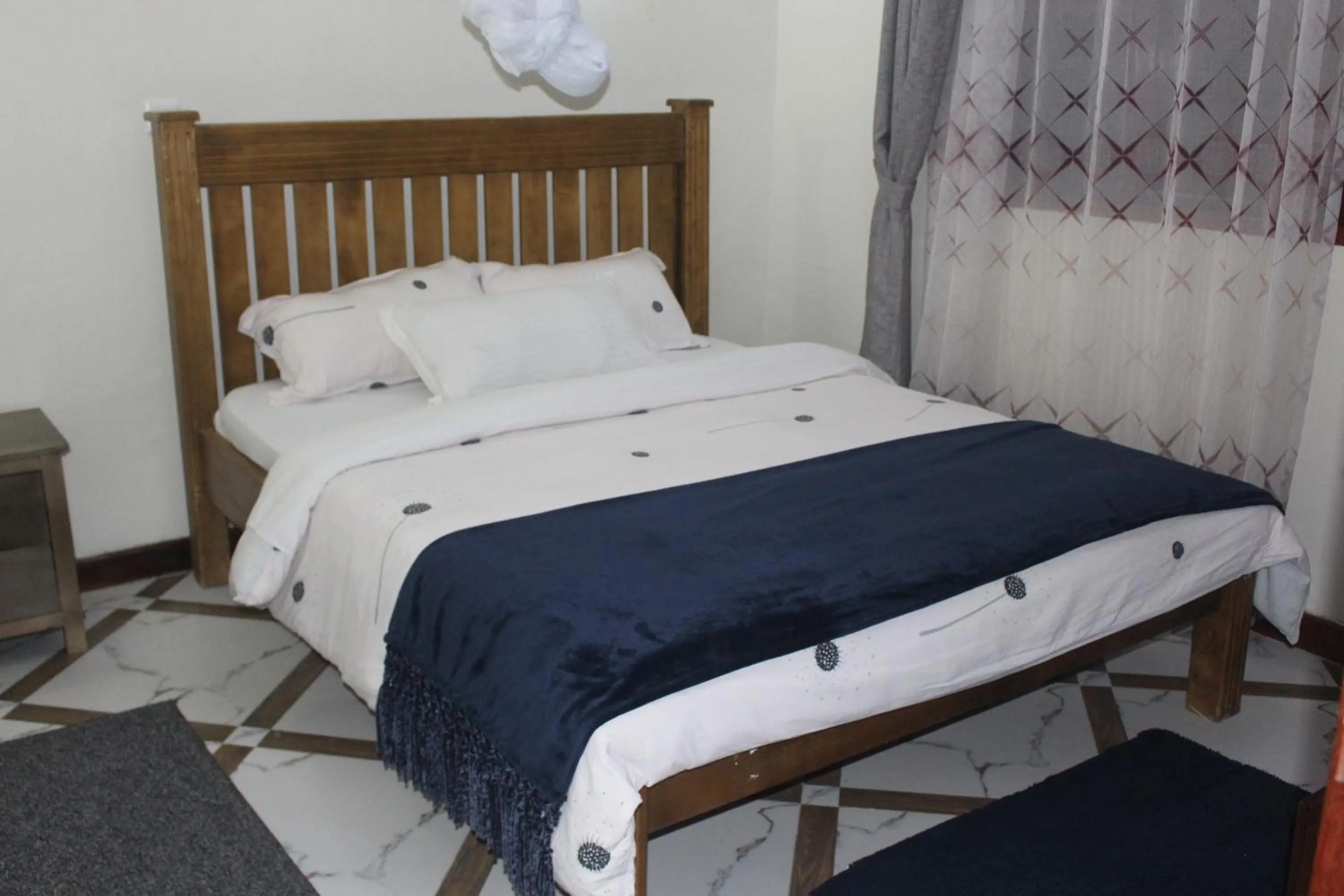 Bed in Montane Safaris Hotel