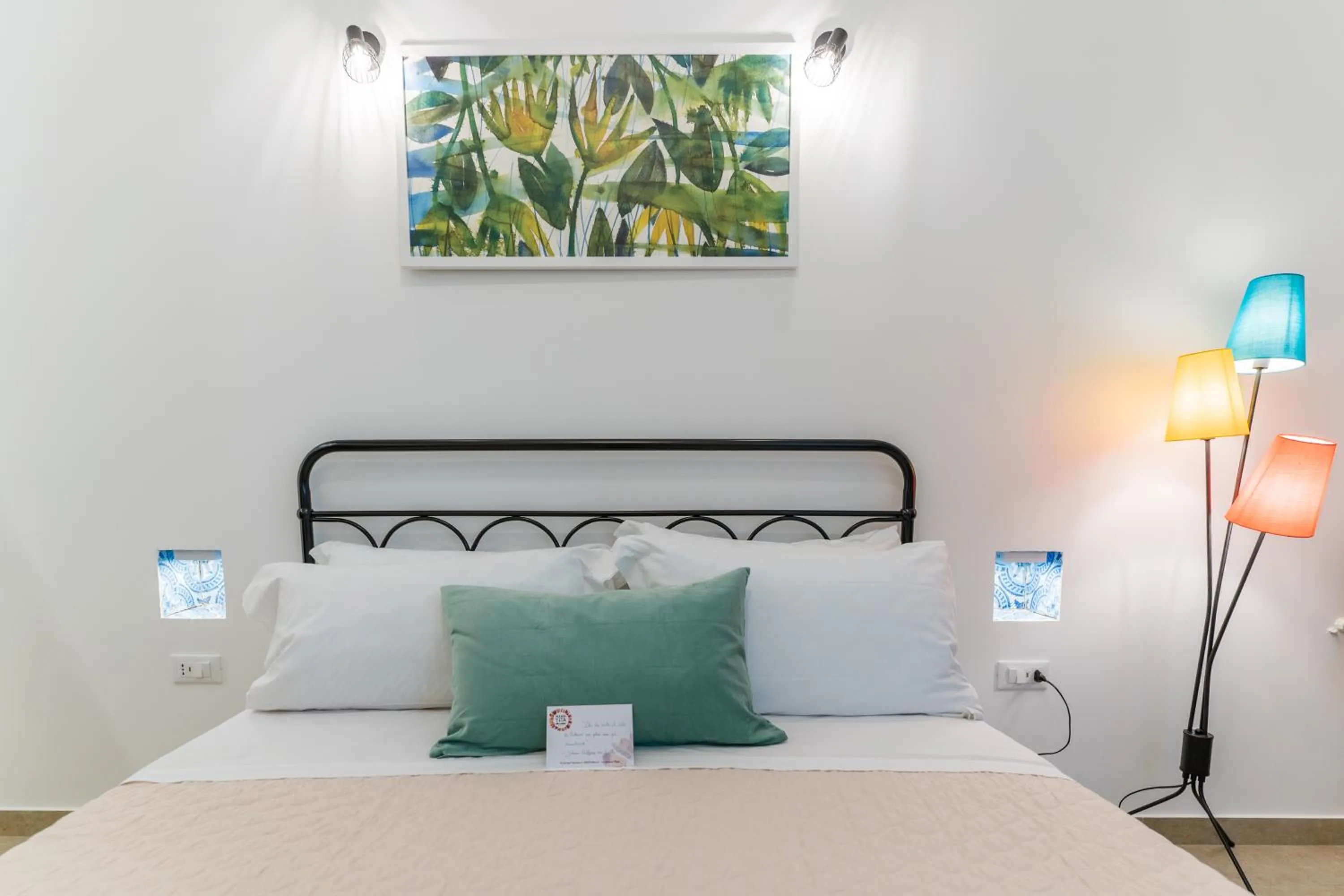 Bed in Mama Tita Rooms and Breakfast